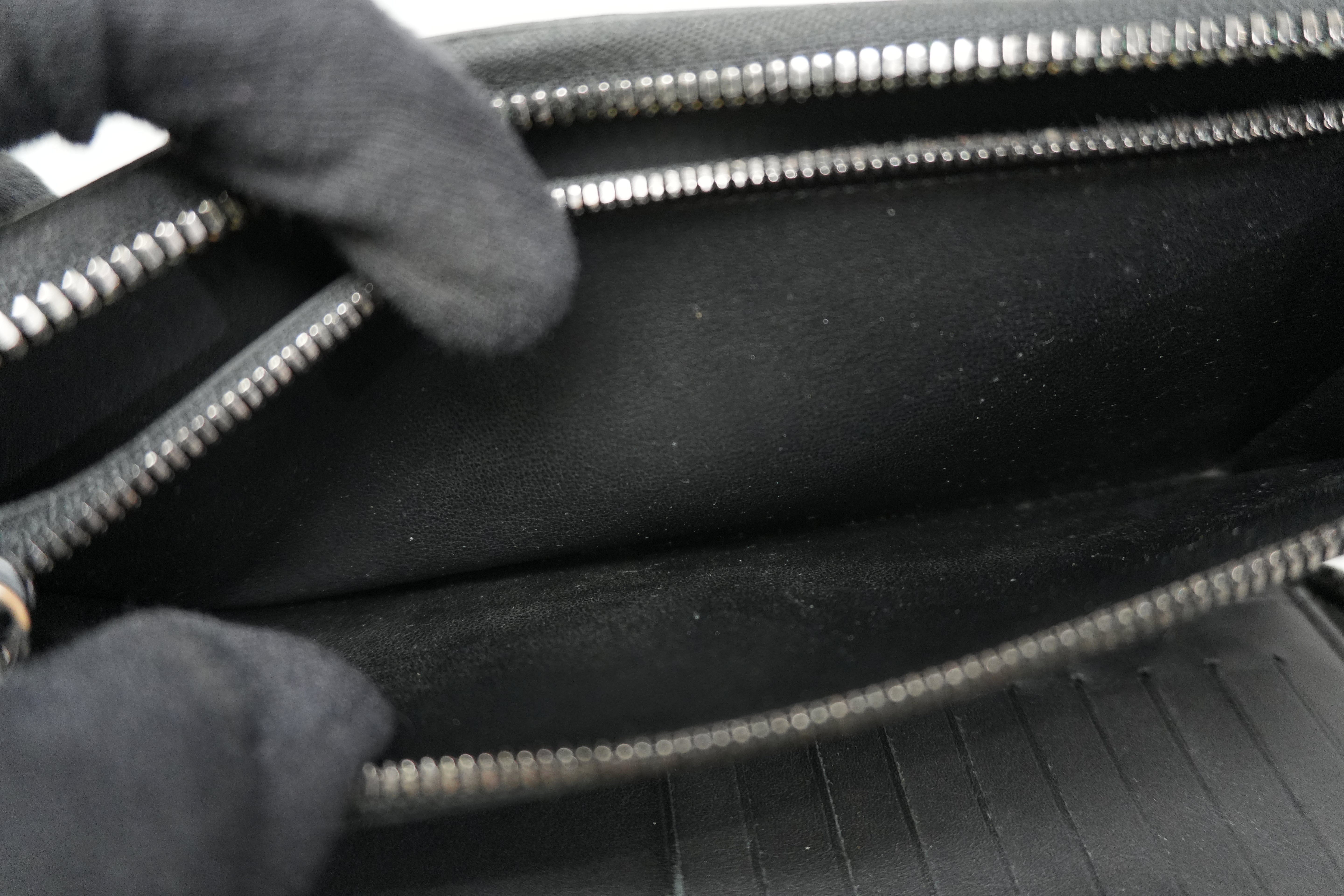 Pre-owned Louis Vuitton Shadow Monogram Vertical Zippy Wallet Black