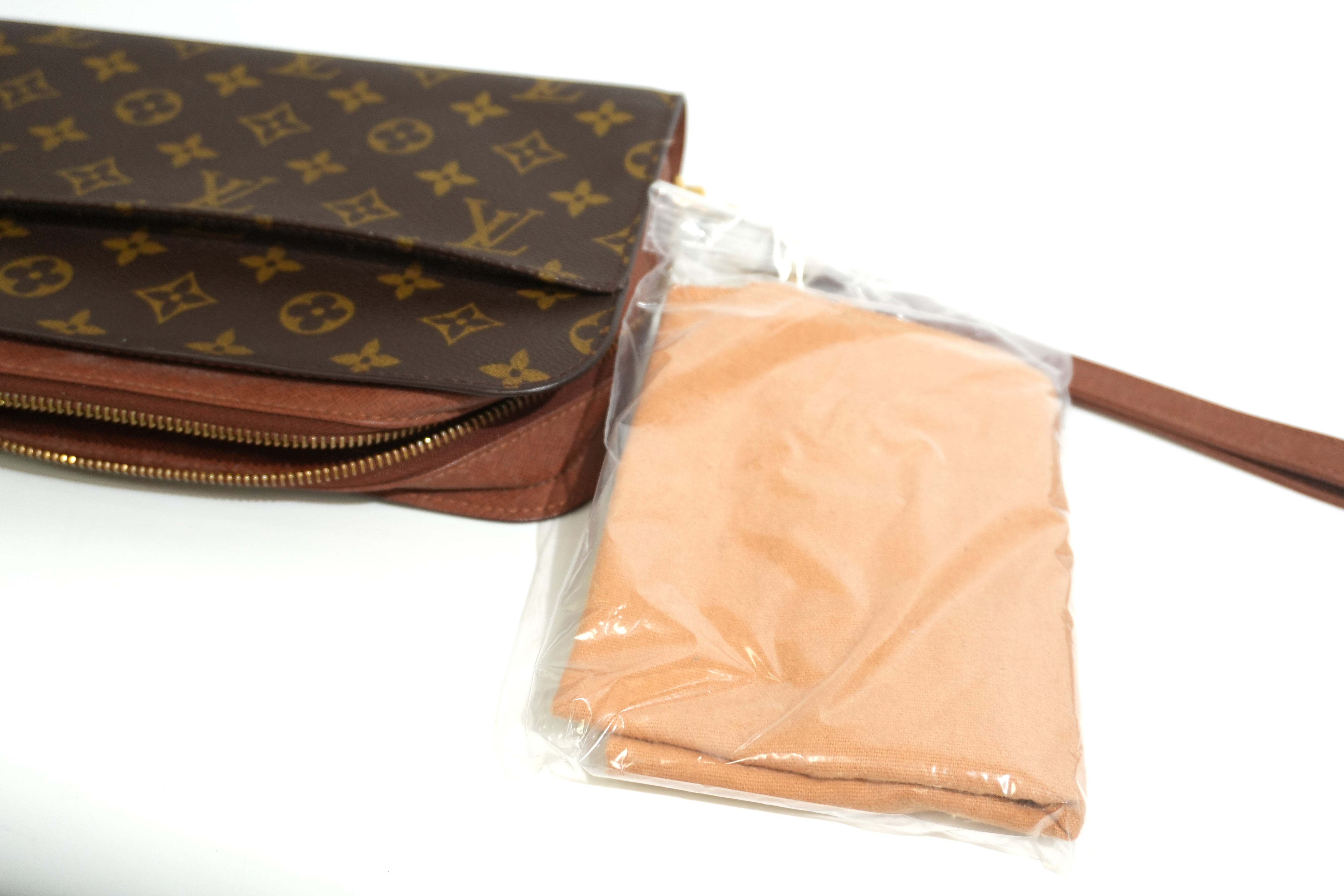 Pre-owned Louis Vuitton Monogram Orsay Clutch