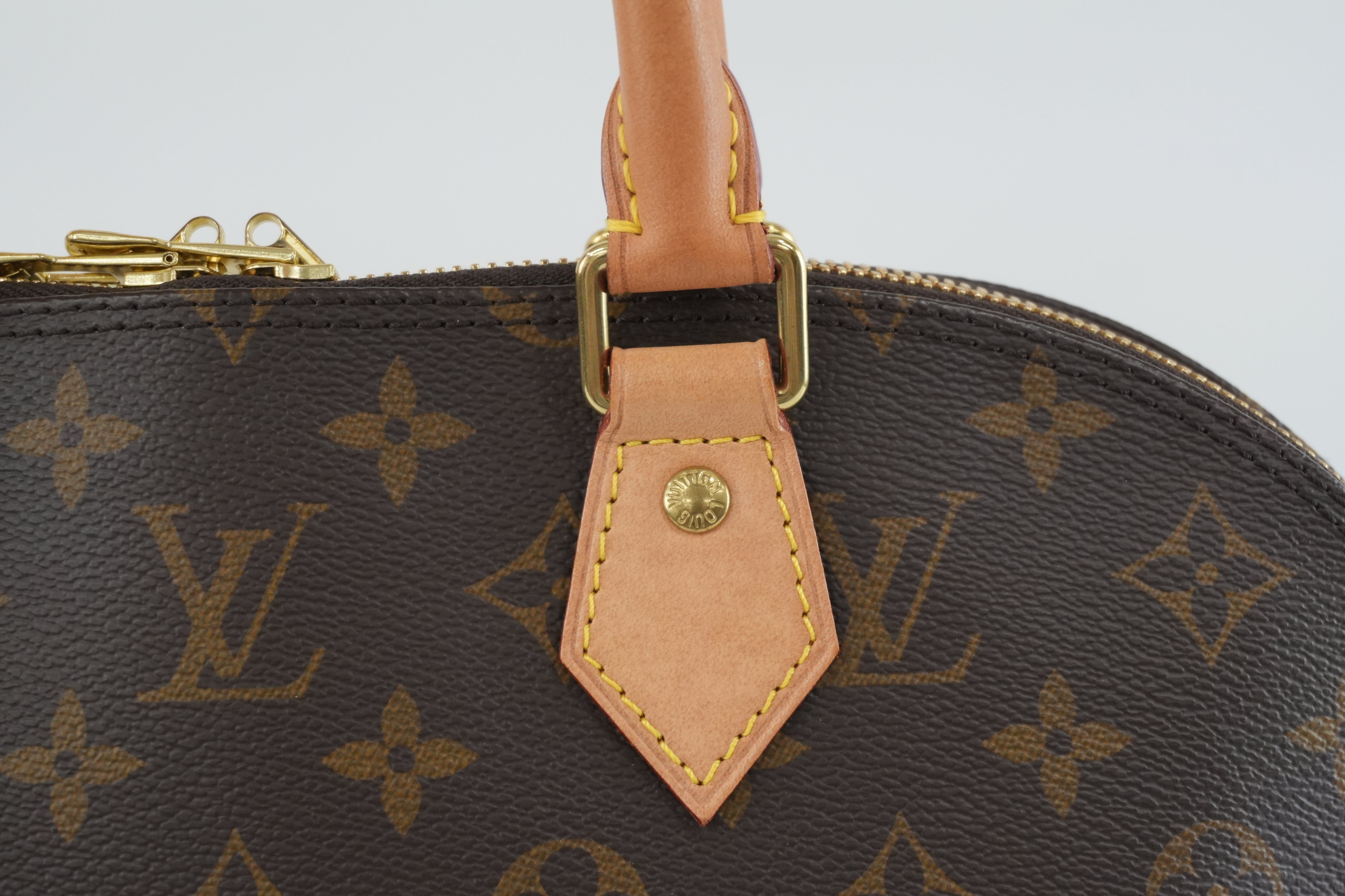 Louis Vuitton Monogram Alma PM Handbag Used