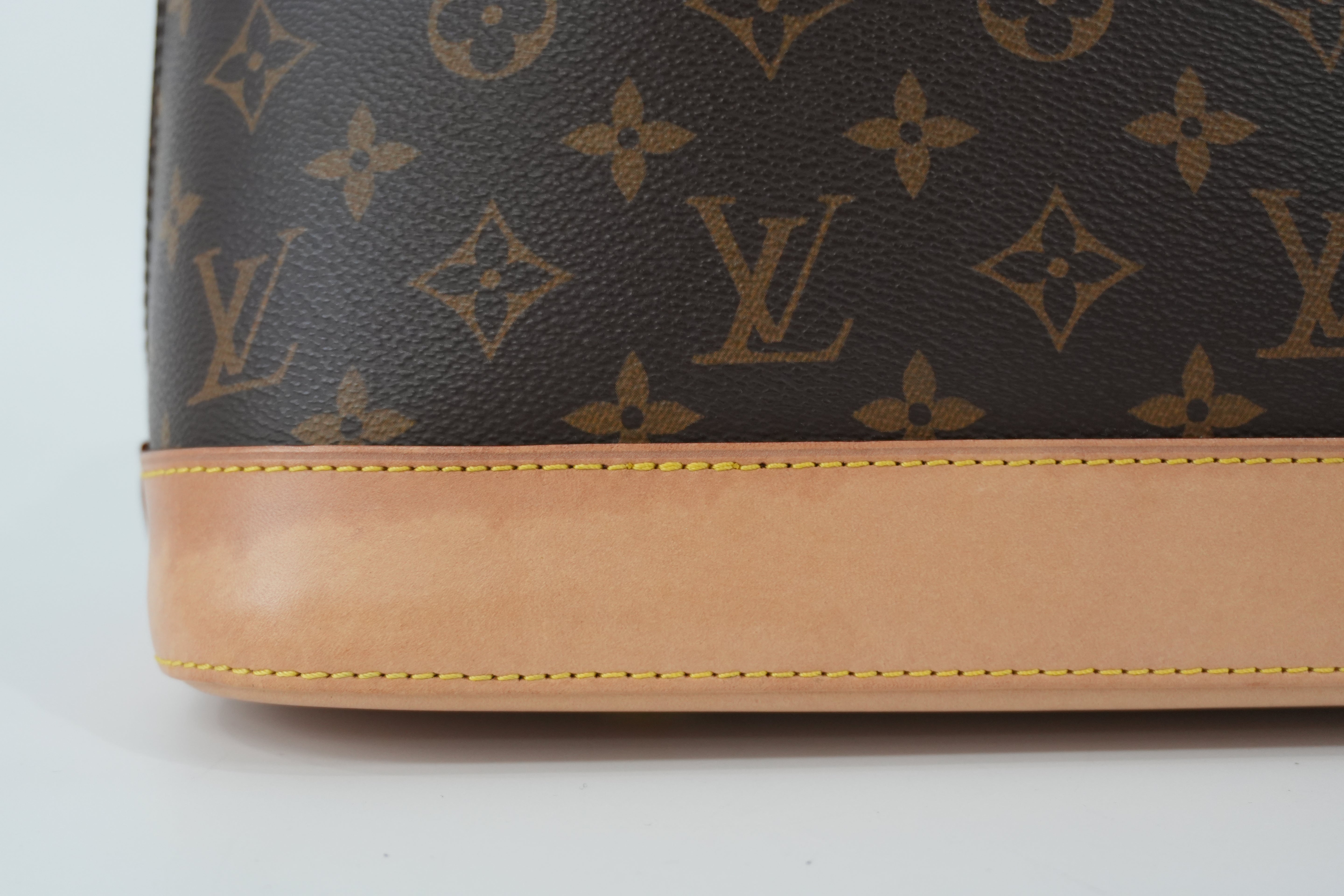 Louis Vuitton Monogram Alma PM Handbag Used