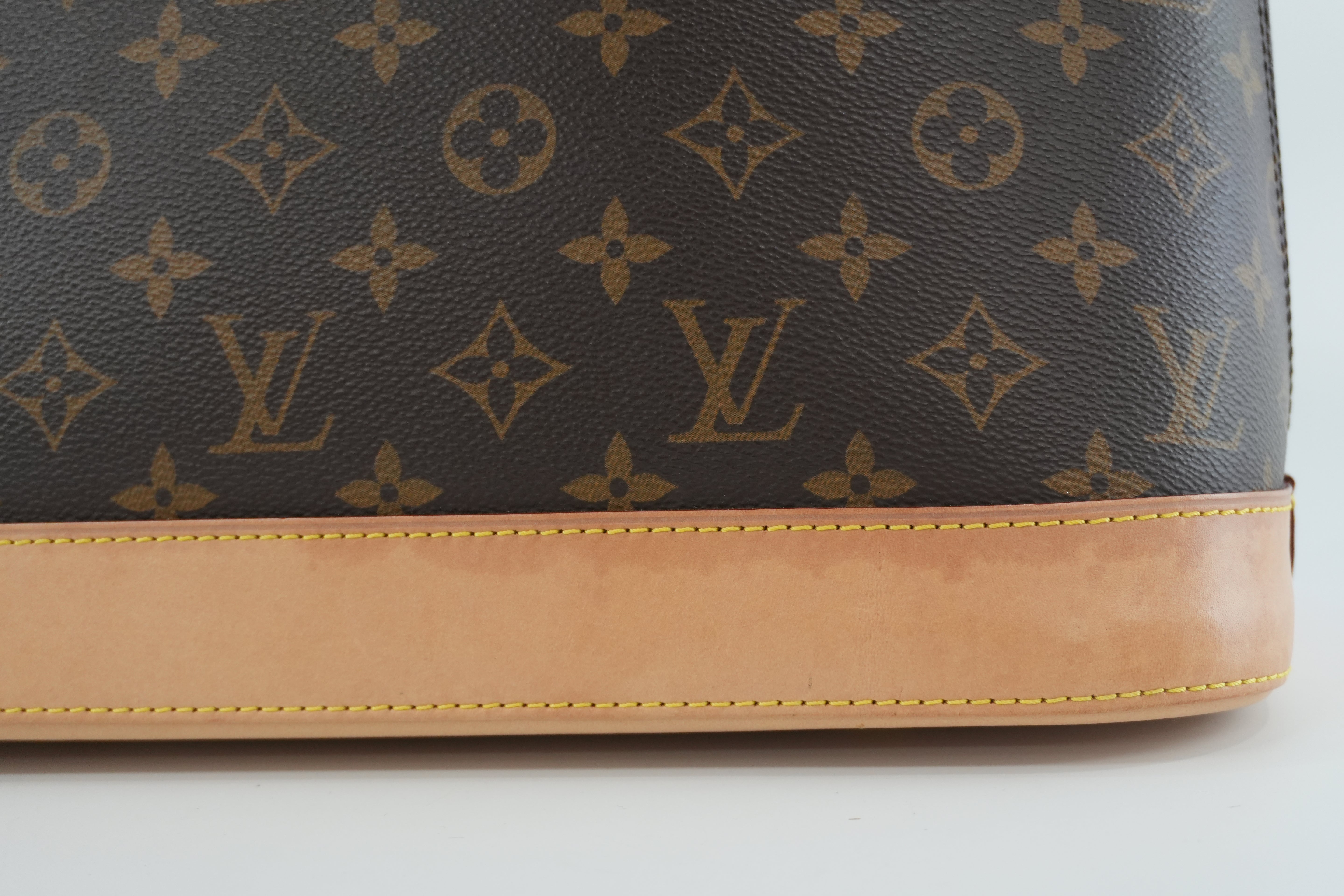 Louis Vuitton Monogram Alma PM Handbag Used