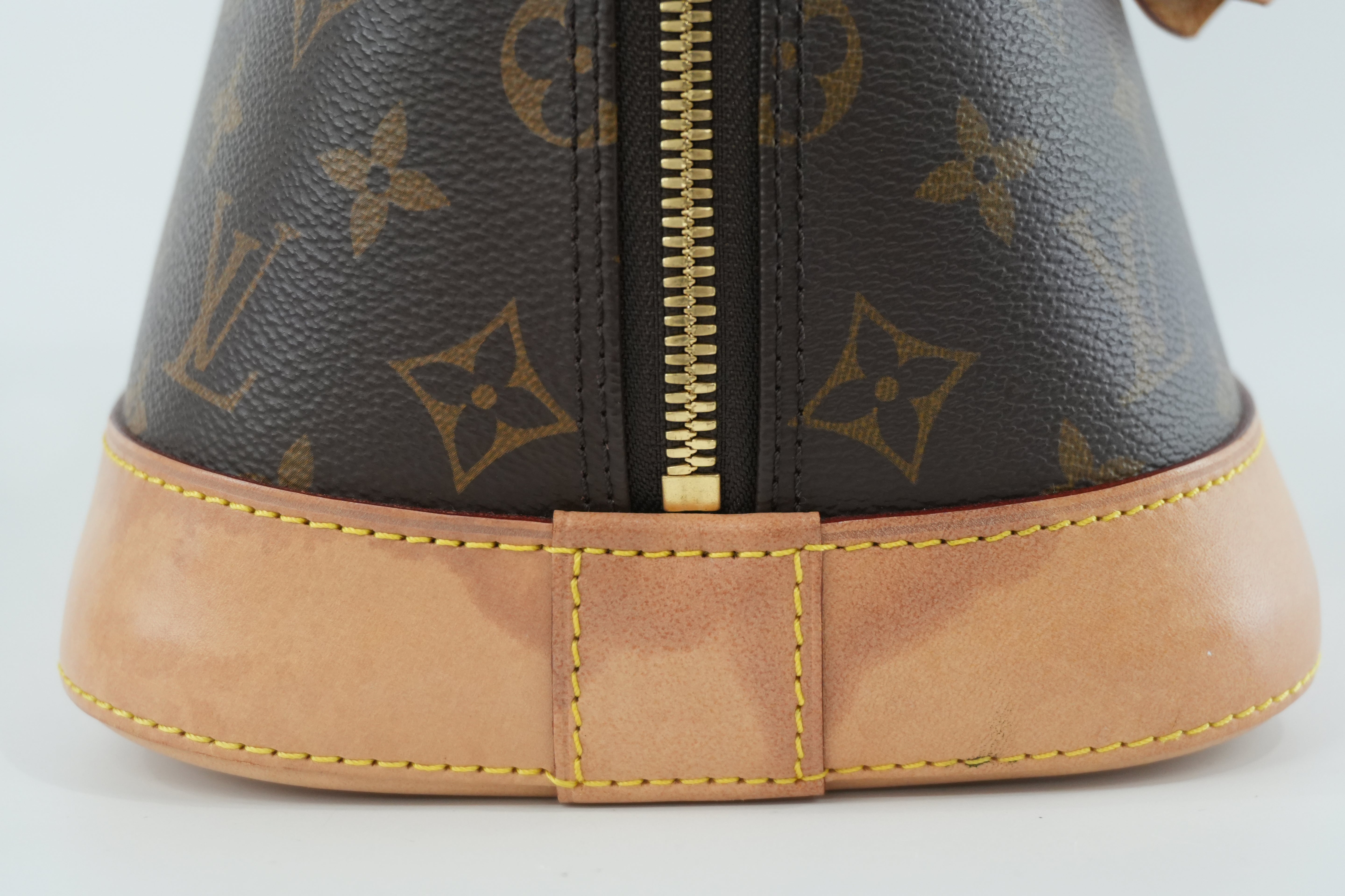 Louis Vuitton Monogram Alma PM Handbag Used