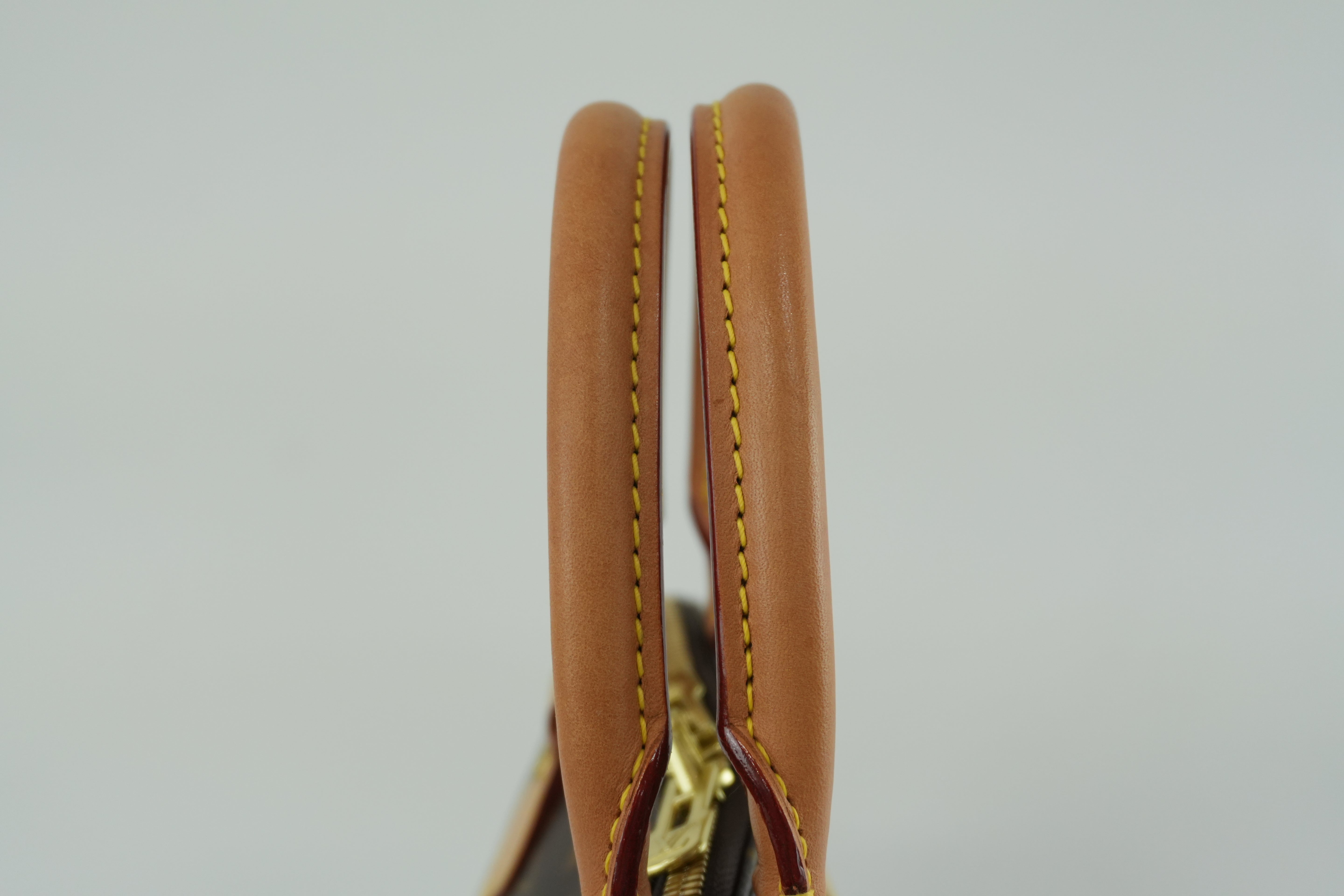 Louis Vuitton Monogram Alma PM Handbag Used