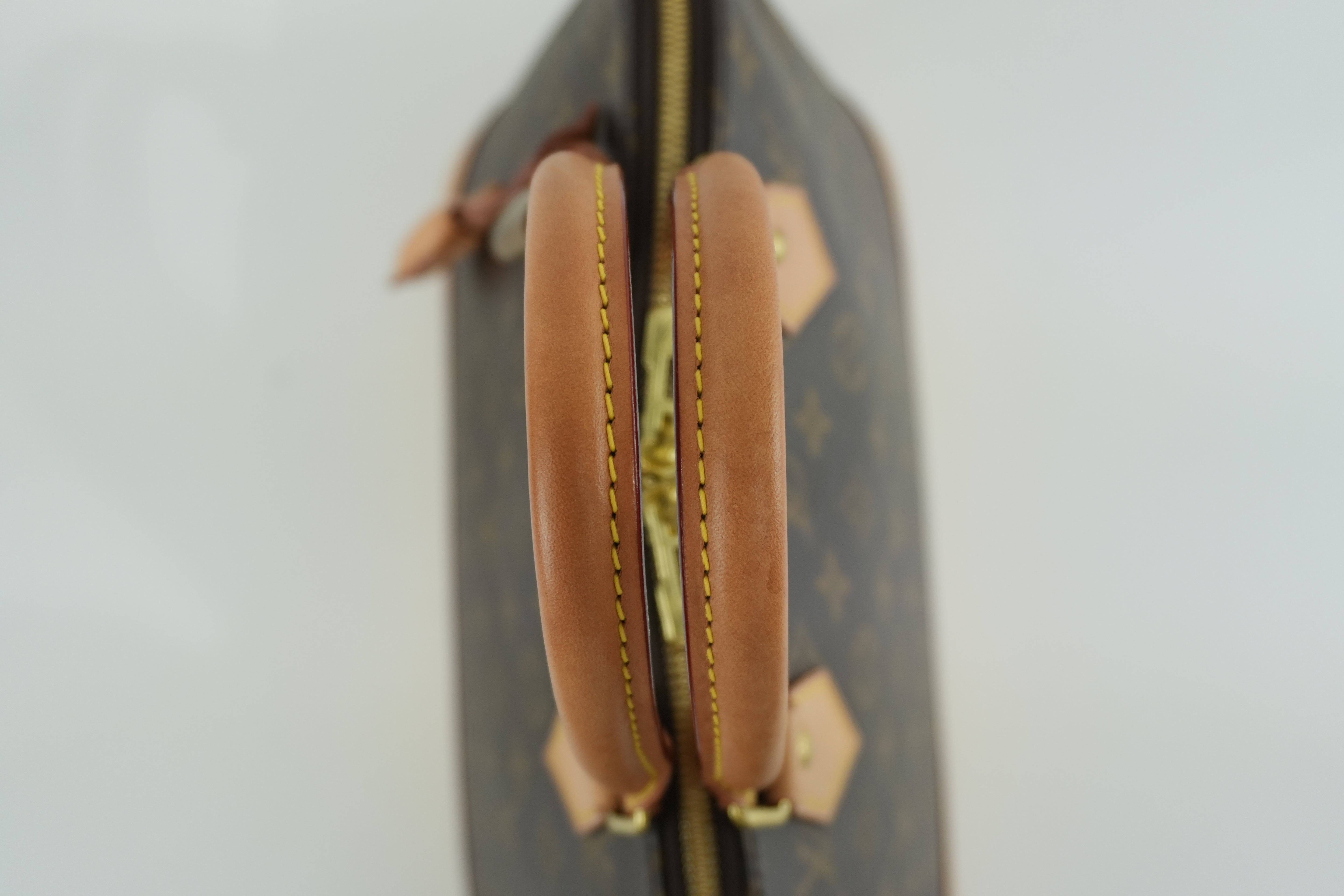 Louis Vuitton Monogram Alma PM Handbag Used