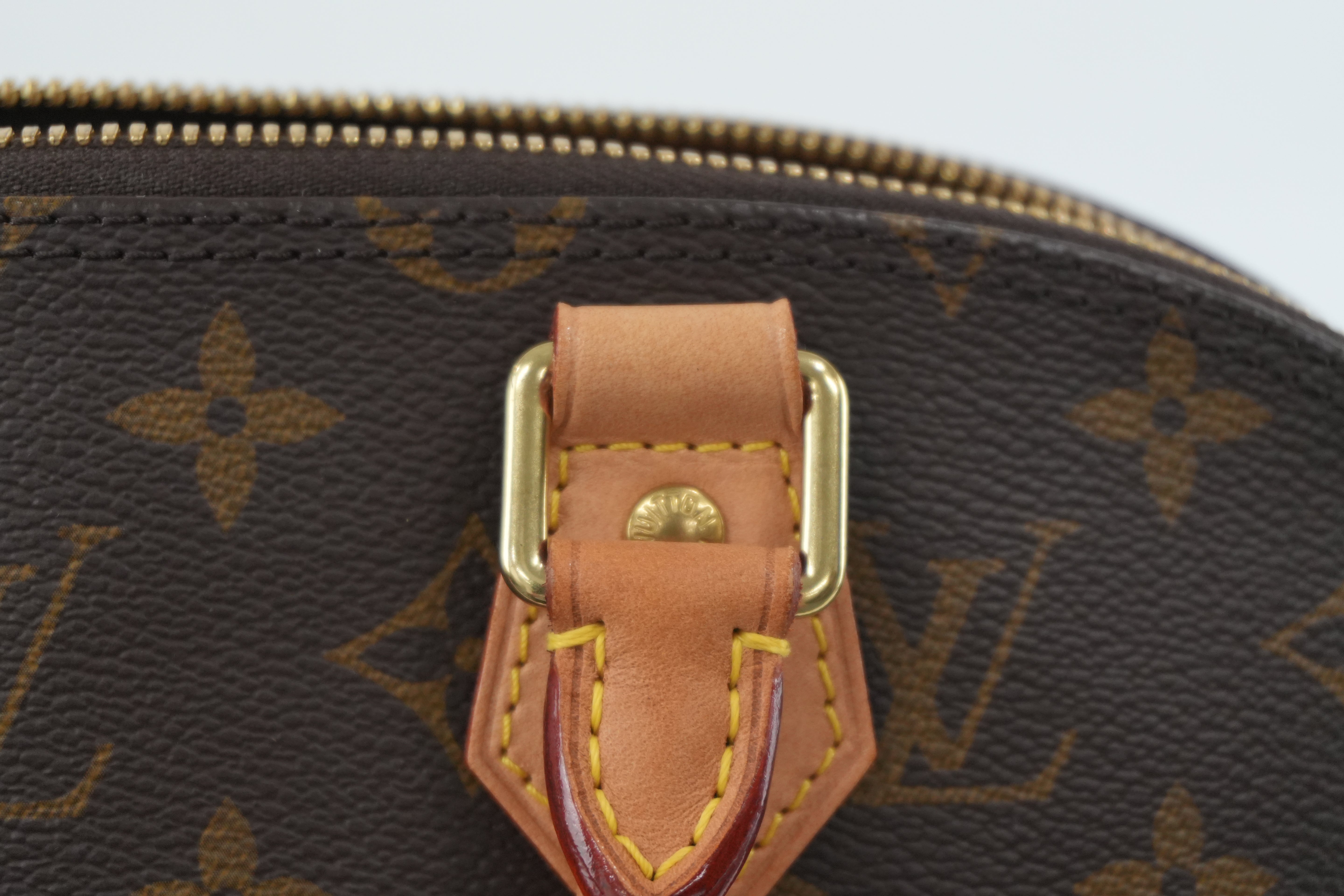 Louis Vuitton Monogram Alma PM Handbag Used