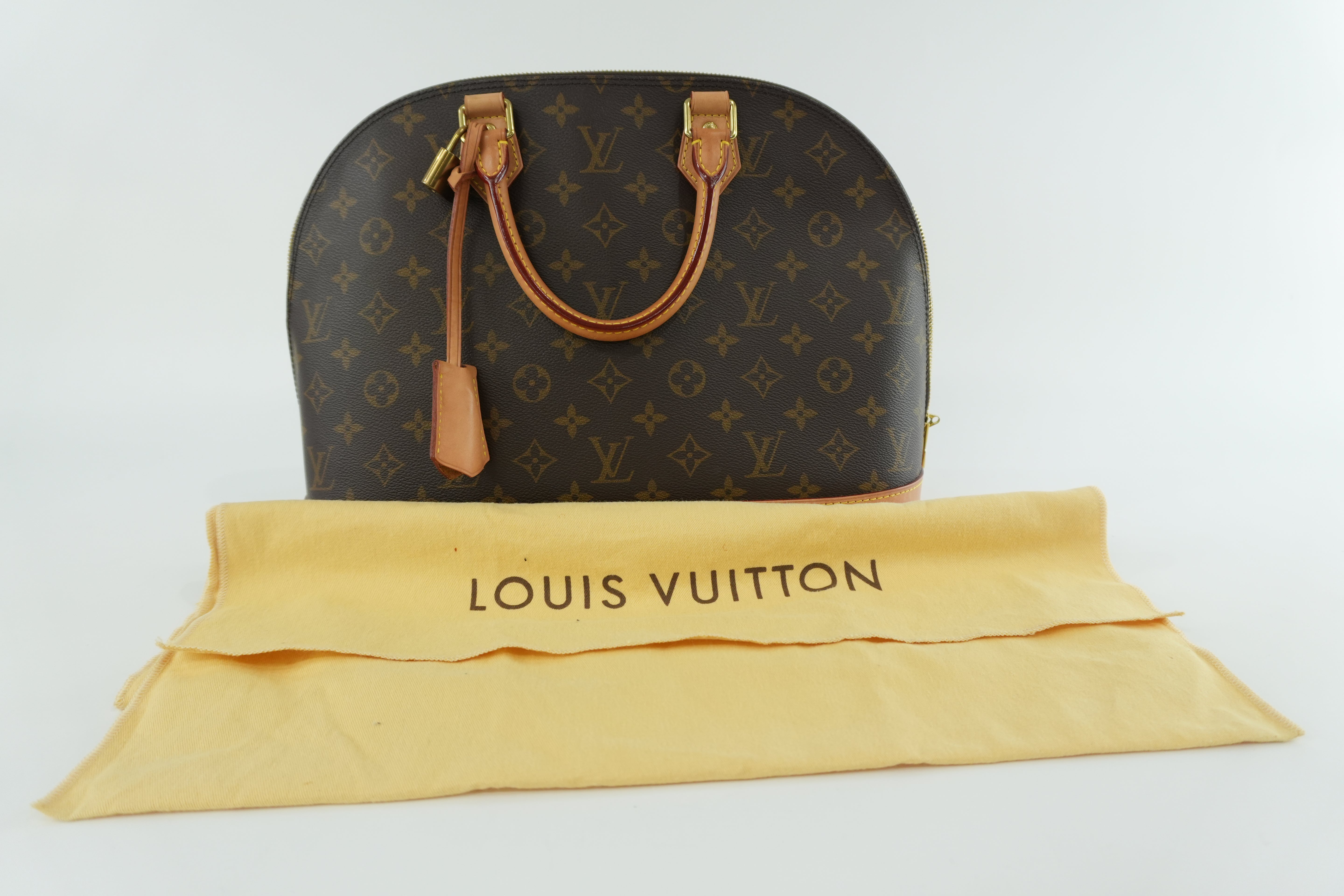 Louis Vuitton Monogram Alma PM Handbag Used