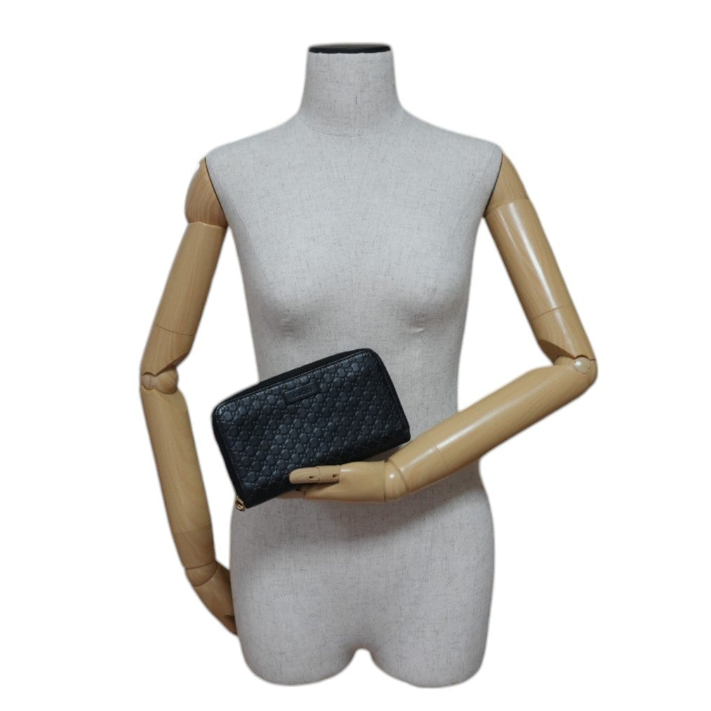 Gucci Micro Guccisima Zippy Wallet Black Leather Used