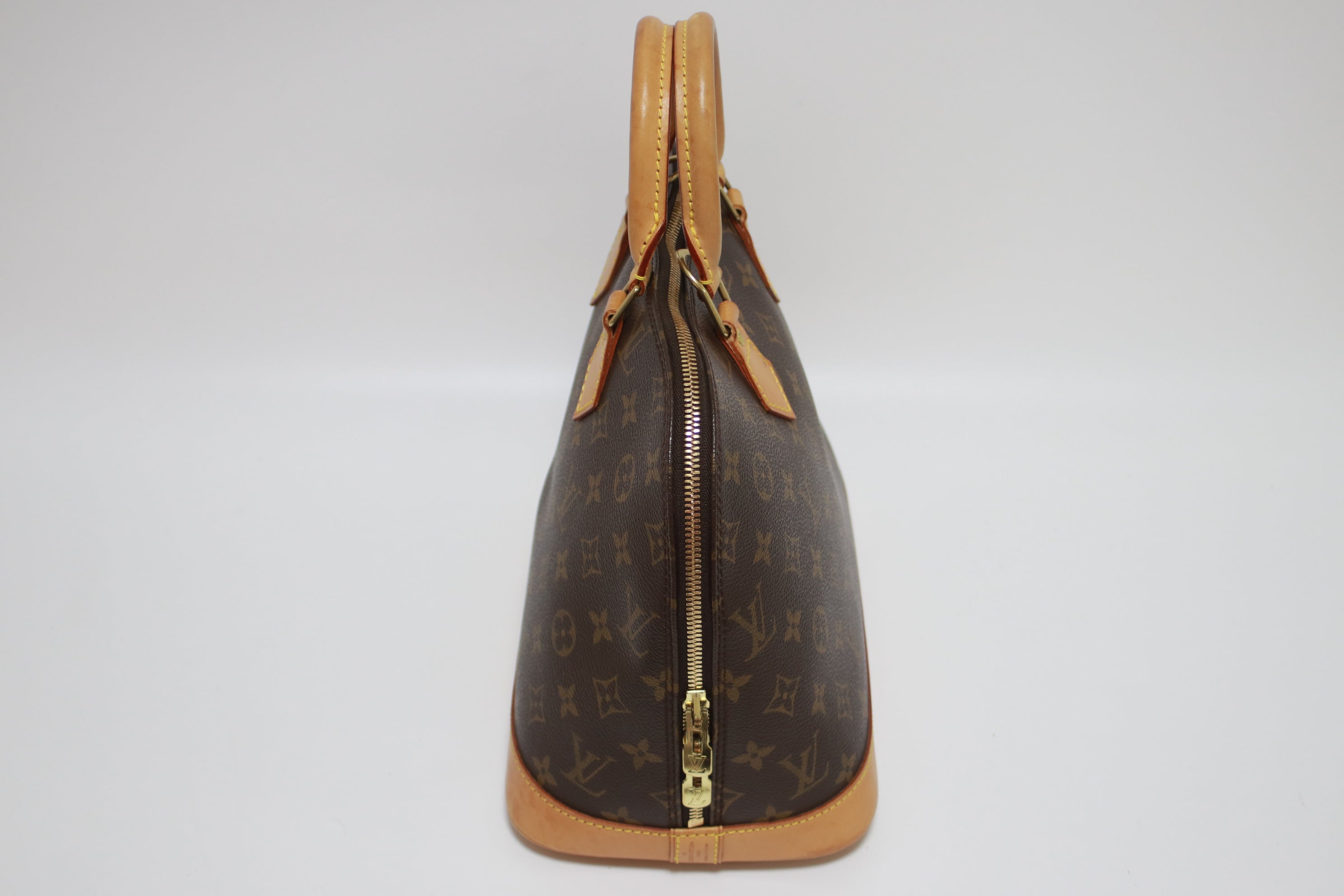 Louis Vuitton Alma PM Handbag Used