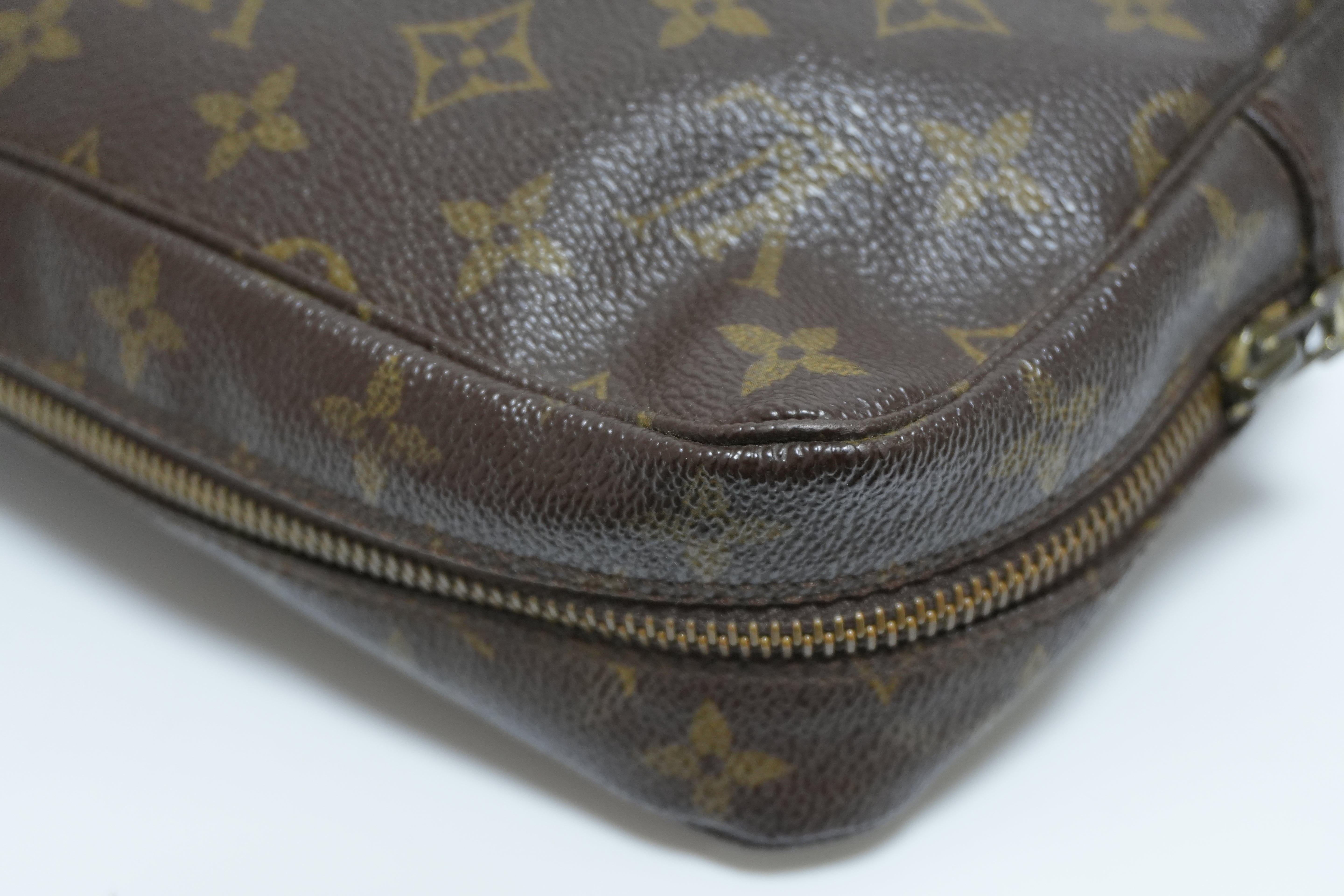 Louis Vuitton Monogram Trousse 23 Canvas Used
