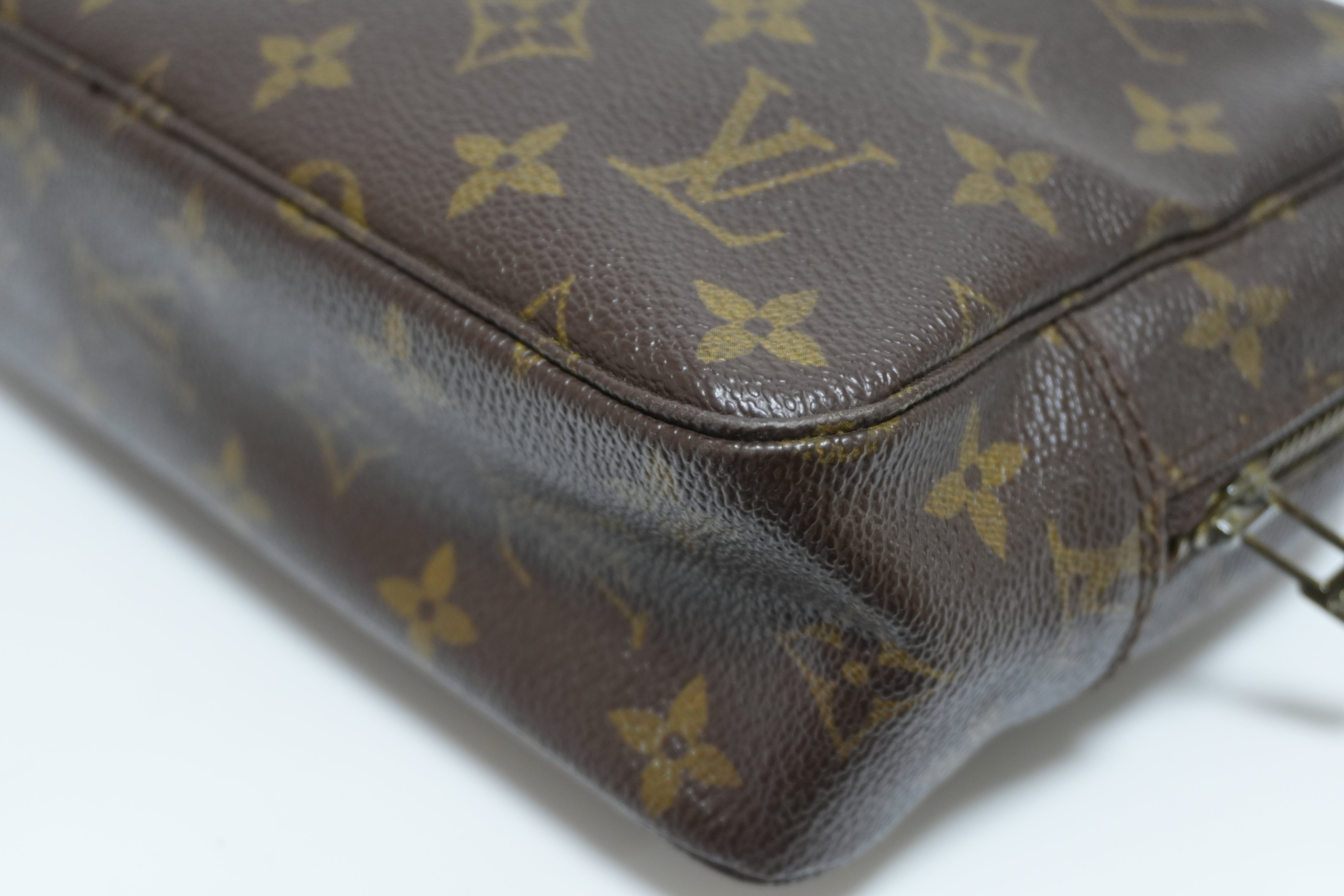 Louis Vuitton Monogram Trousse 23 Canvas Used