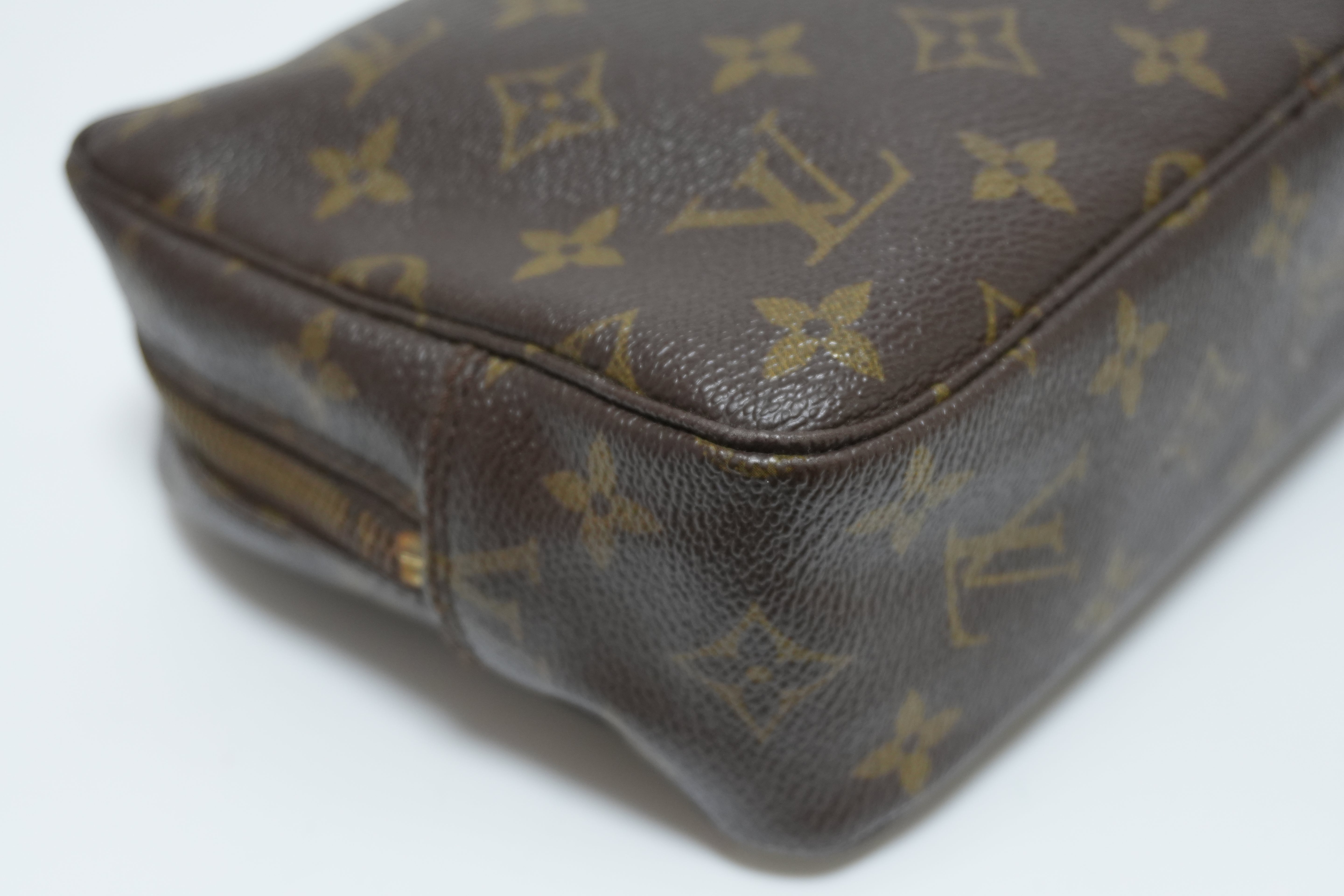 Louis Vuitton Monogram Trousse 23 Canvas Used