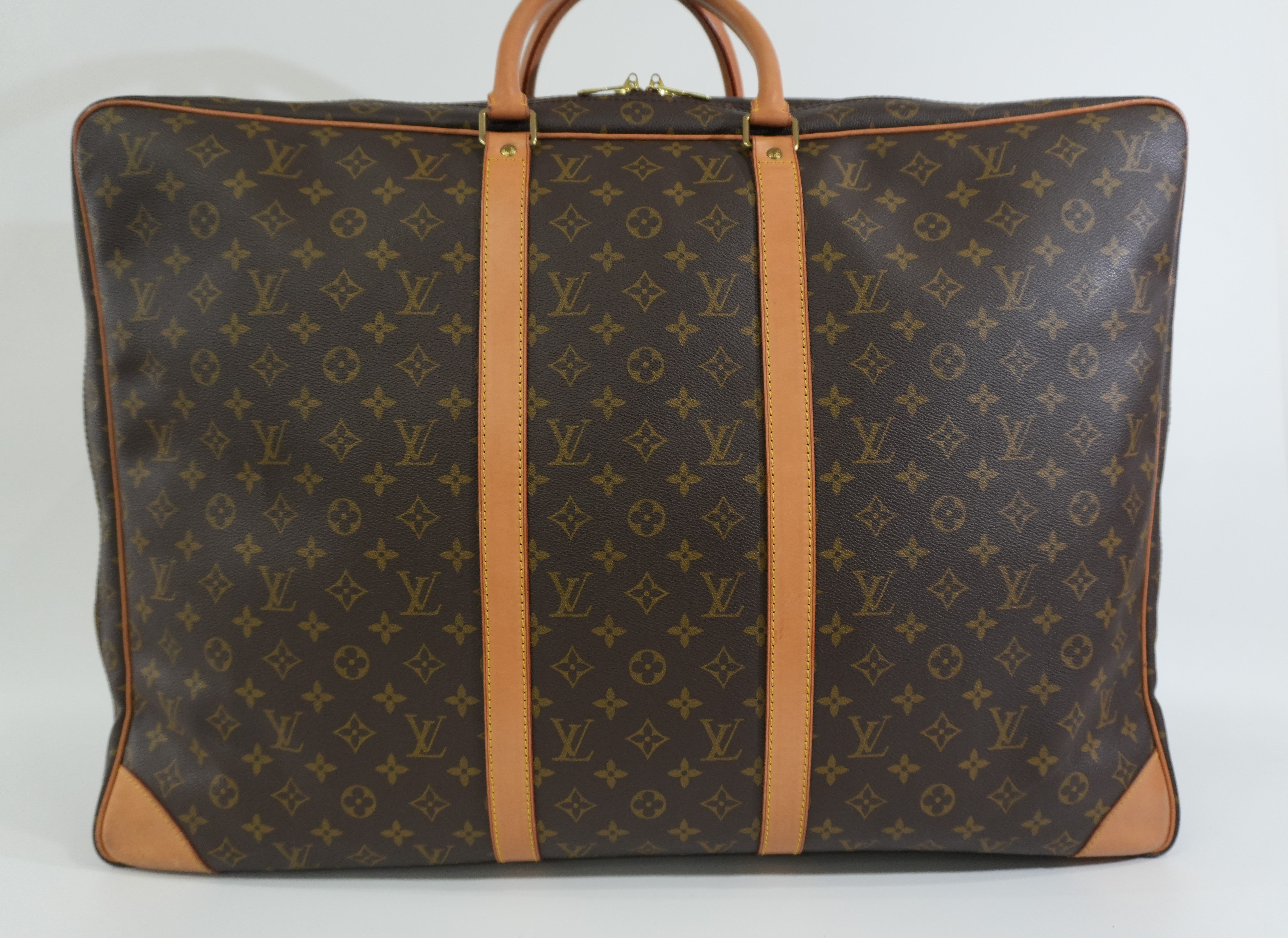 Pre-owned Louis Vuitton Monogram Sirius Travel Bag