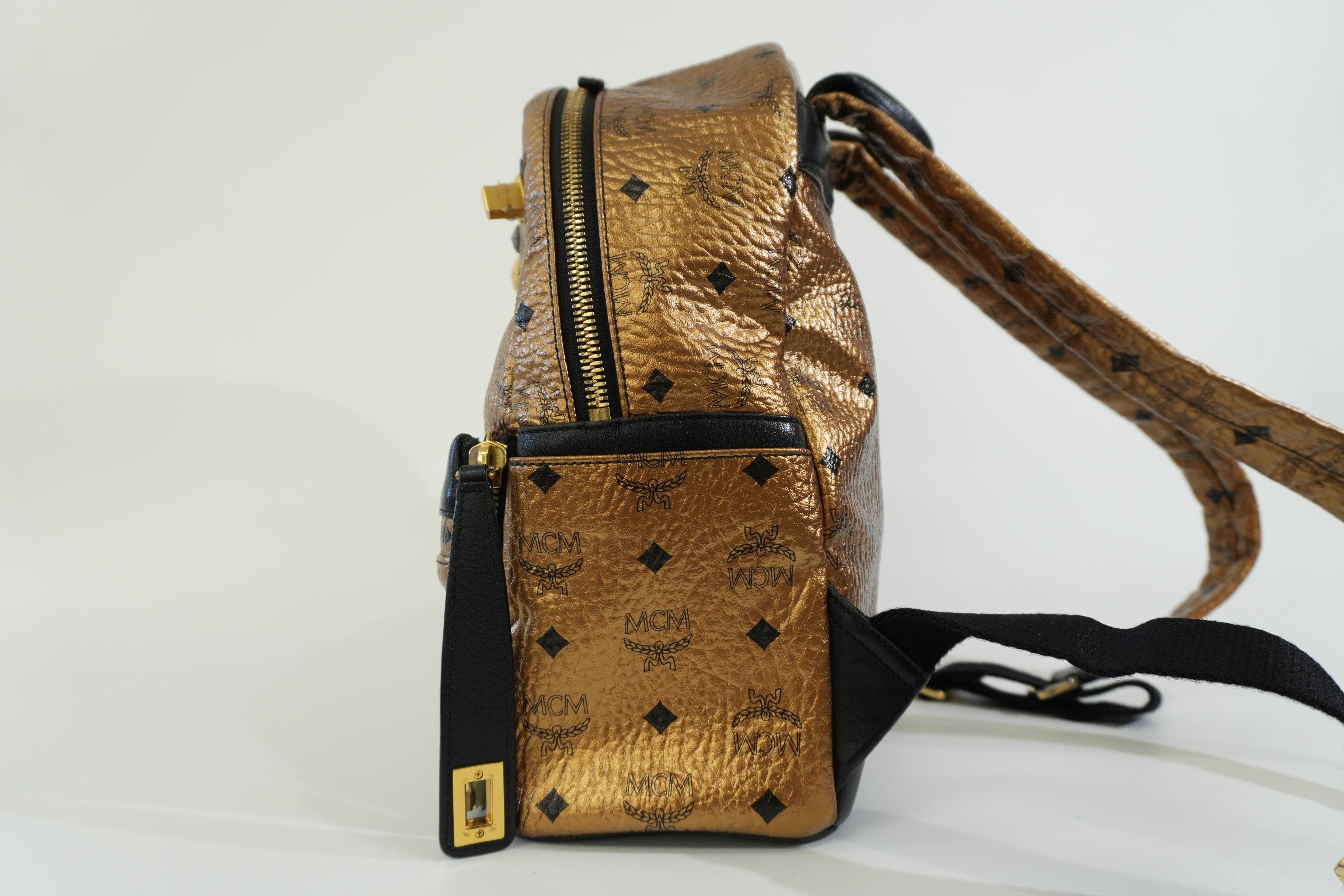 Pre-owned MCM Metallic Backpack with Detachable Pouch Gold
