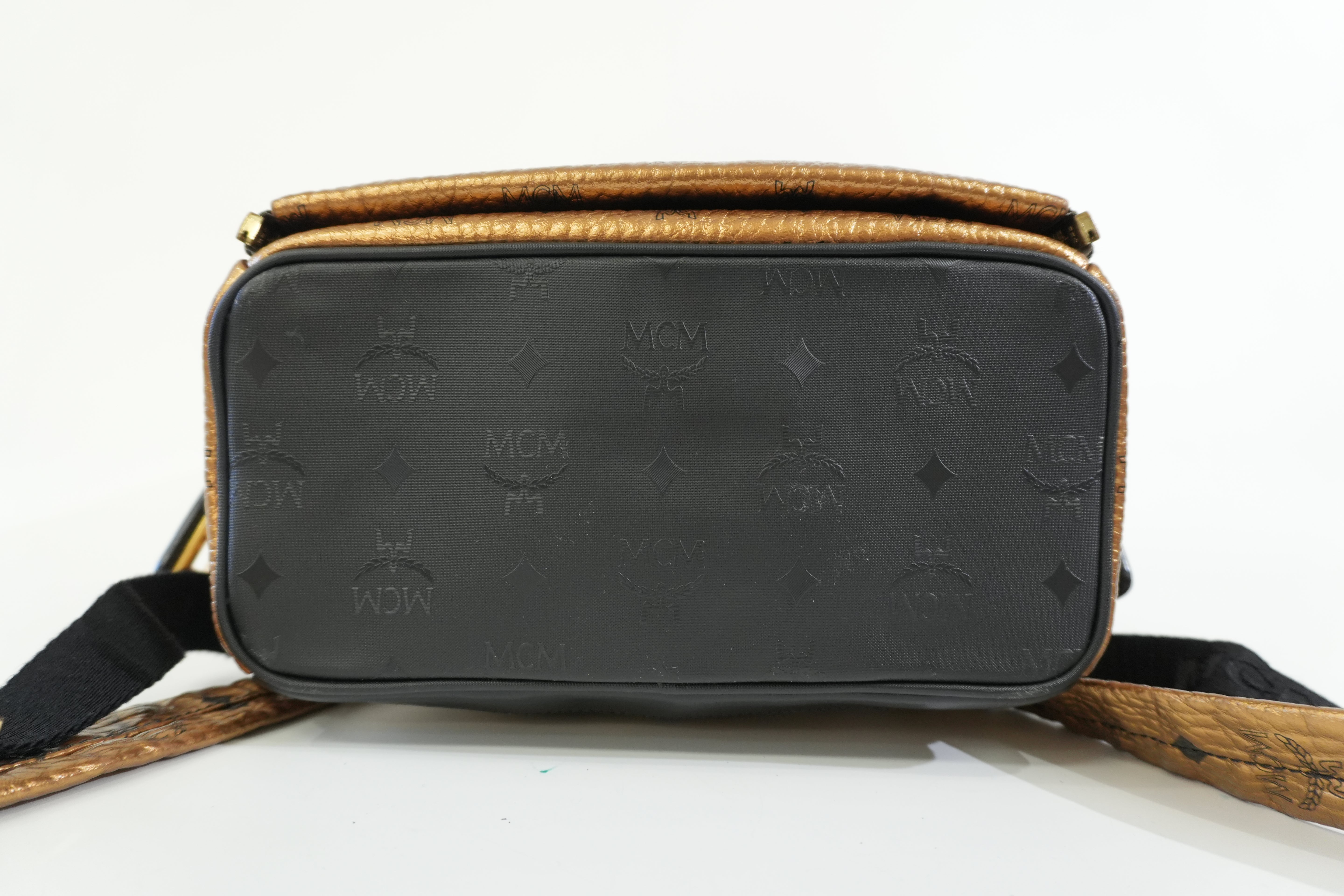 Pre-owned MCM Metallic Backpack with Detachable Pouch Gold