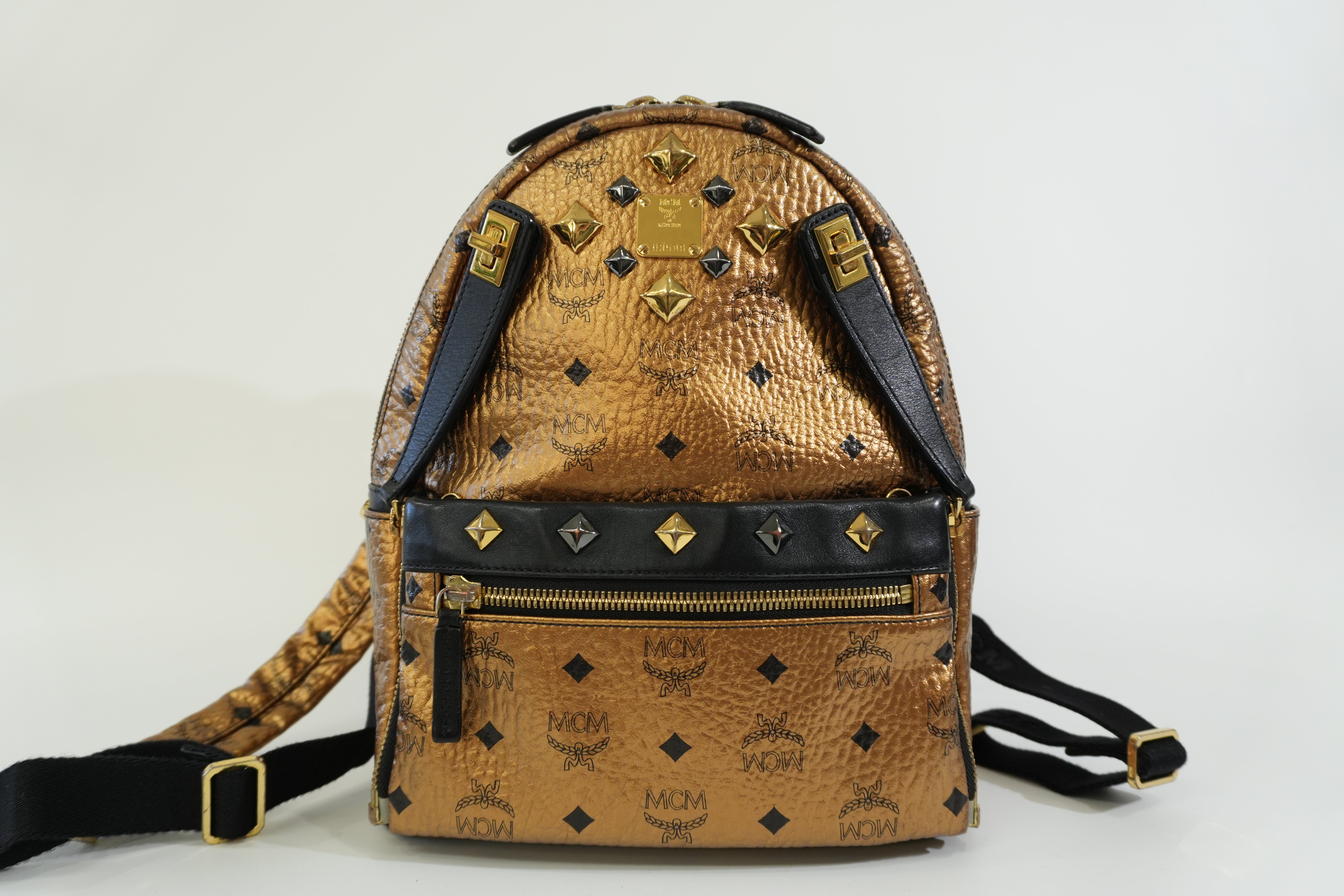 Pre-owned MCM Metallic Backpack with Detachable Pouch Gold