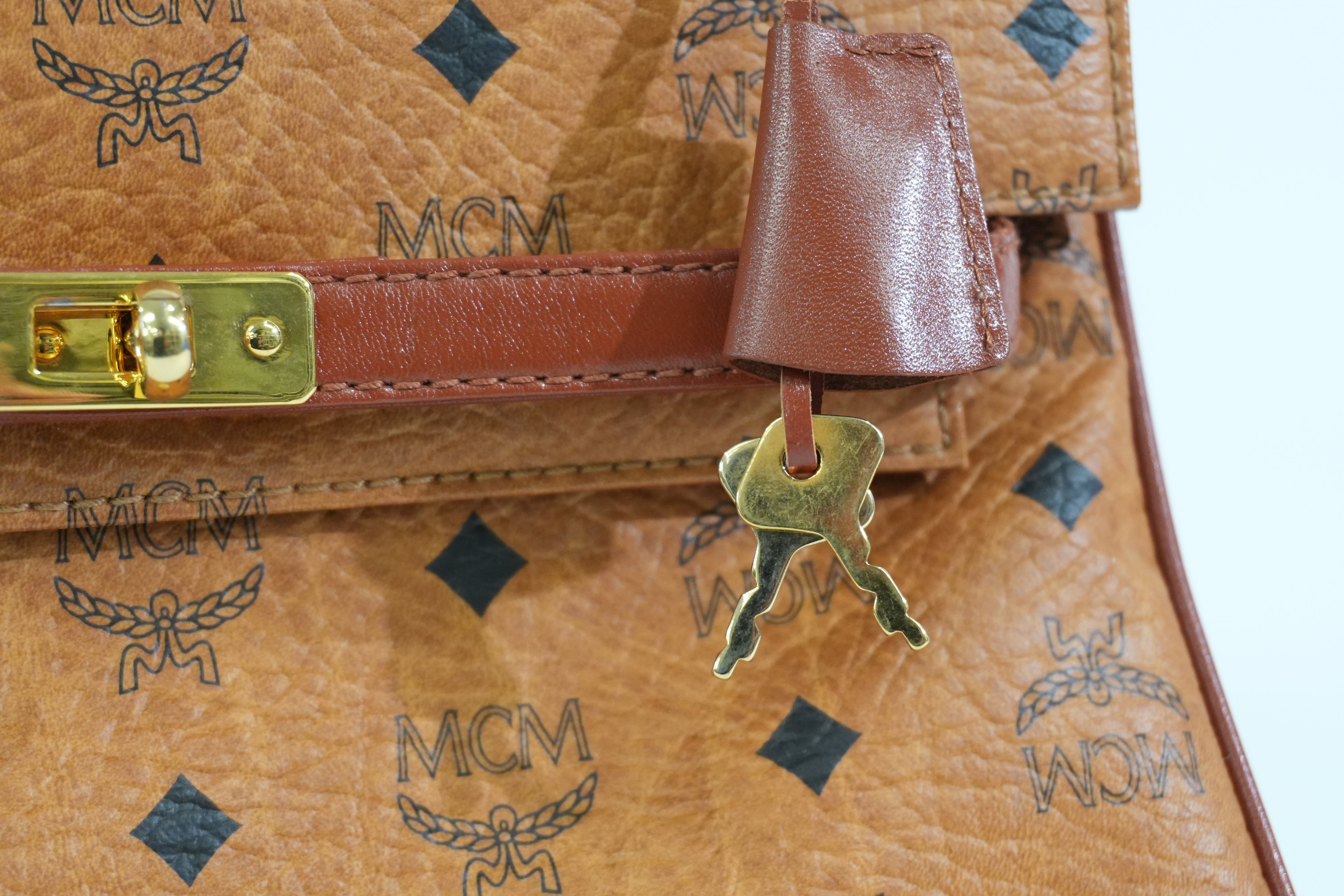 Pre-owned MCM Visetos Top Handle Handbag Cognac