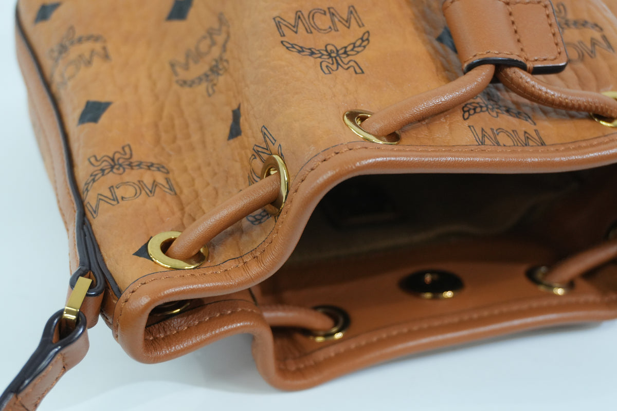 Pre-Owned MCM Park Rabbit Visetos Drawstring Crossbody bag Cognac