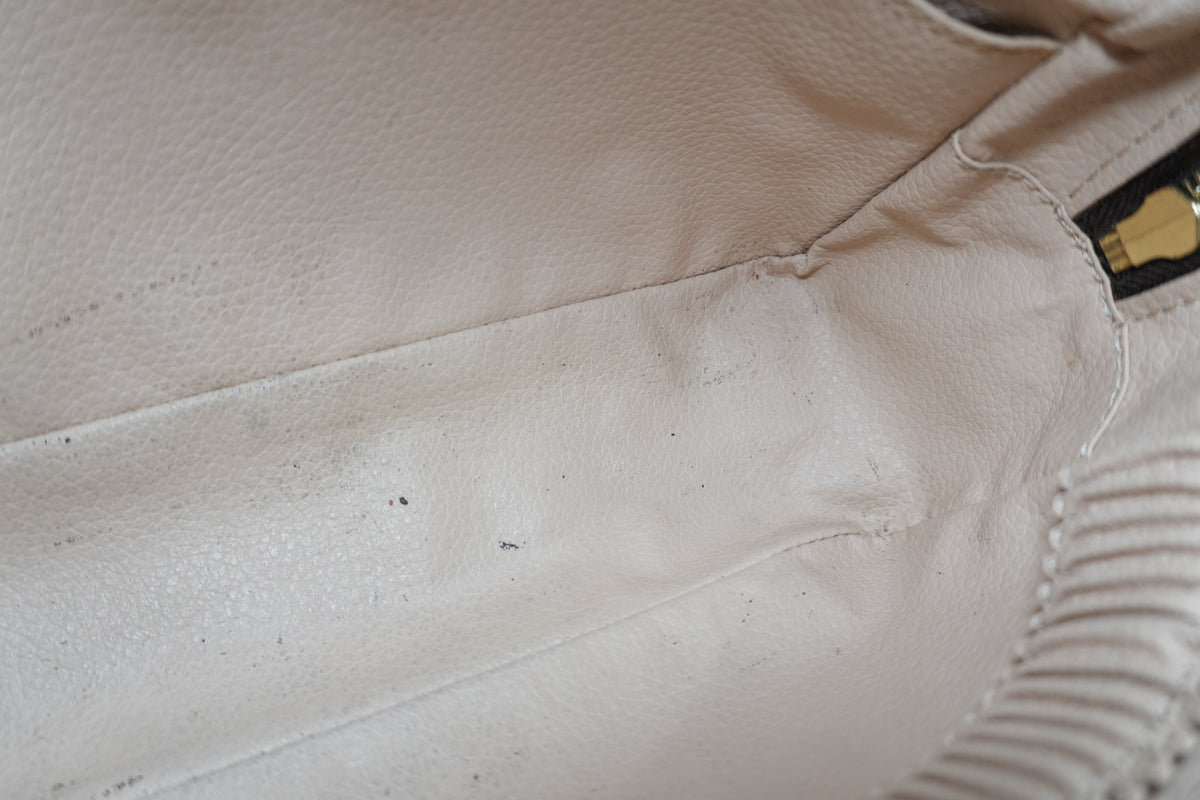 Pre-Owned Louis Vuitton Monogram Trousse 28
