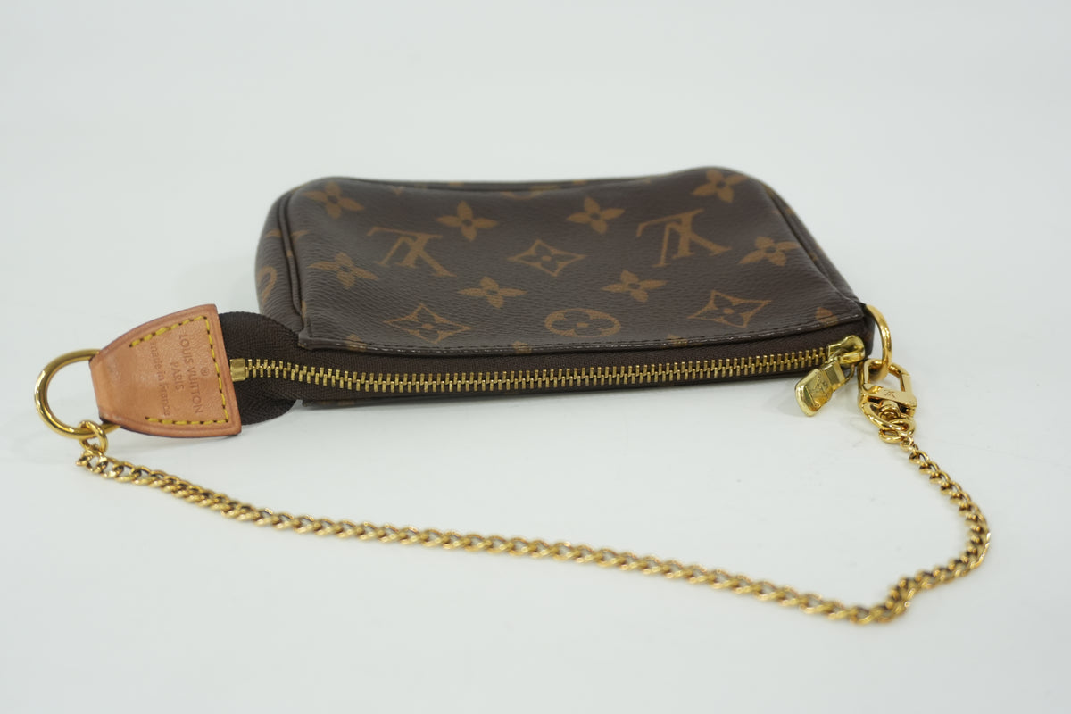 Pre-Owned Louis Vuitton Monogram Mini Pochette Accessories