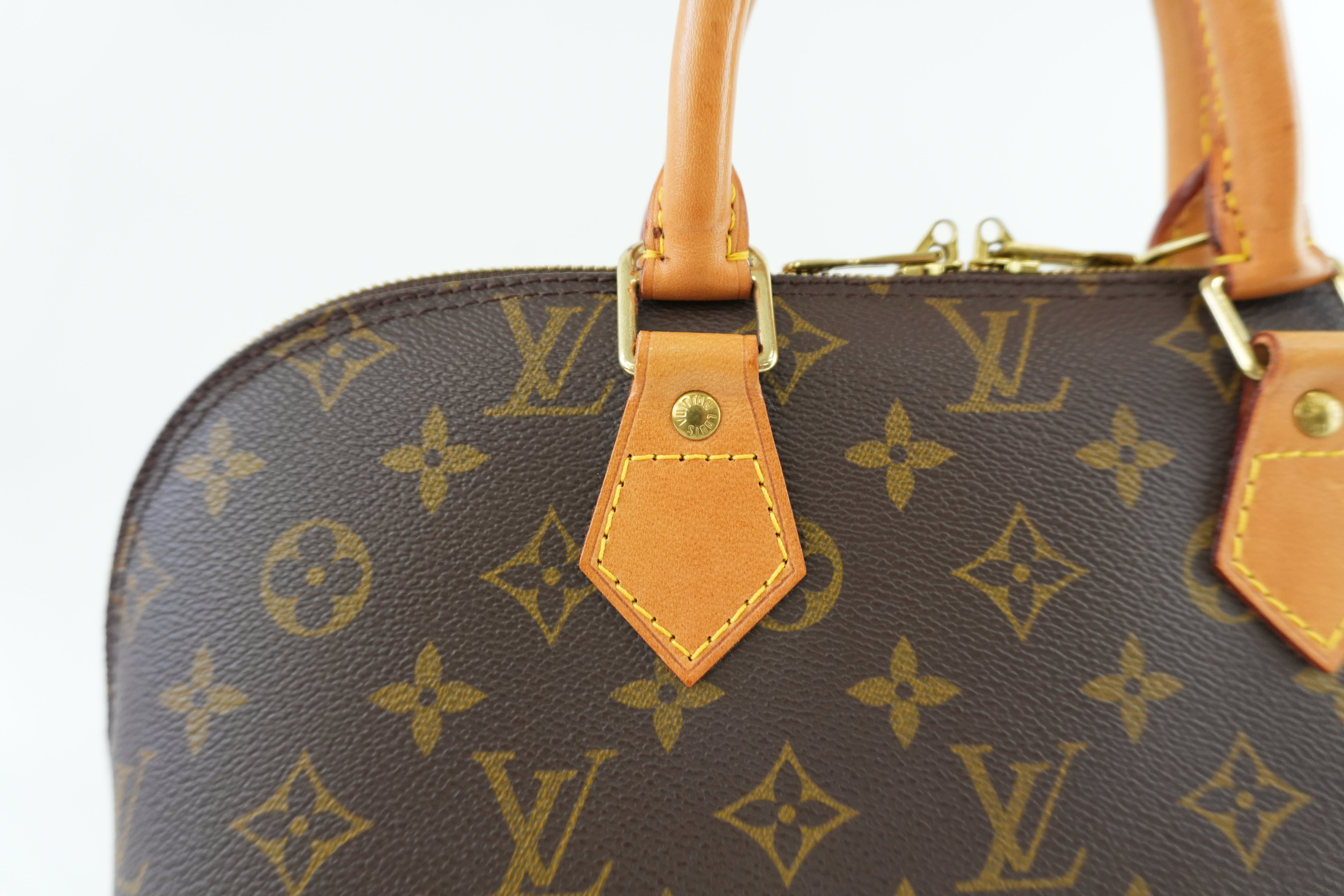 Louis Vuitton Monogram Alma Handbag Used