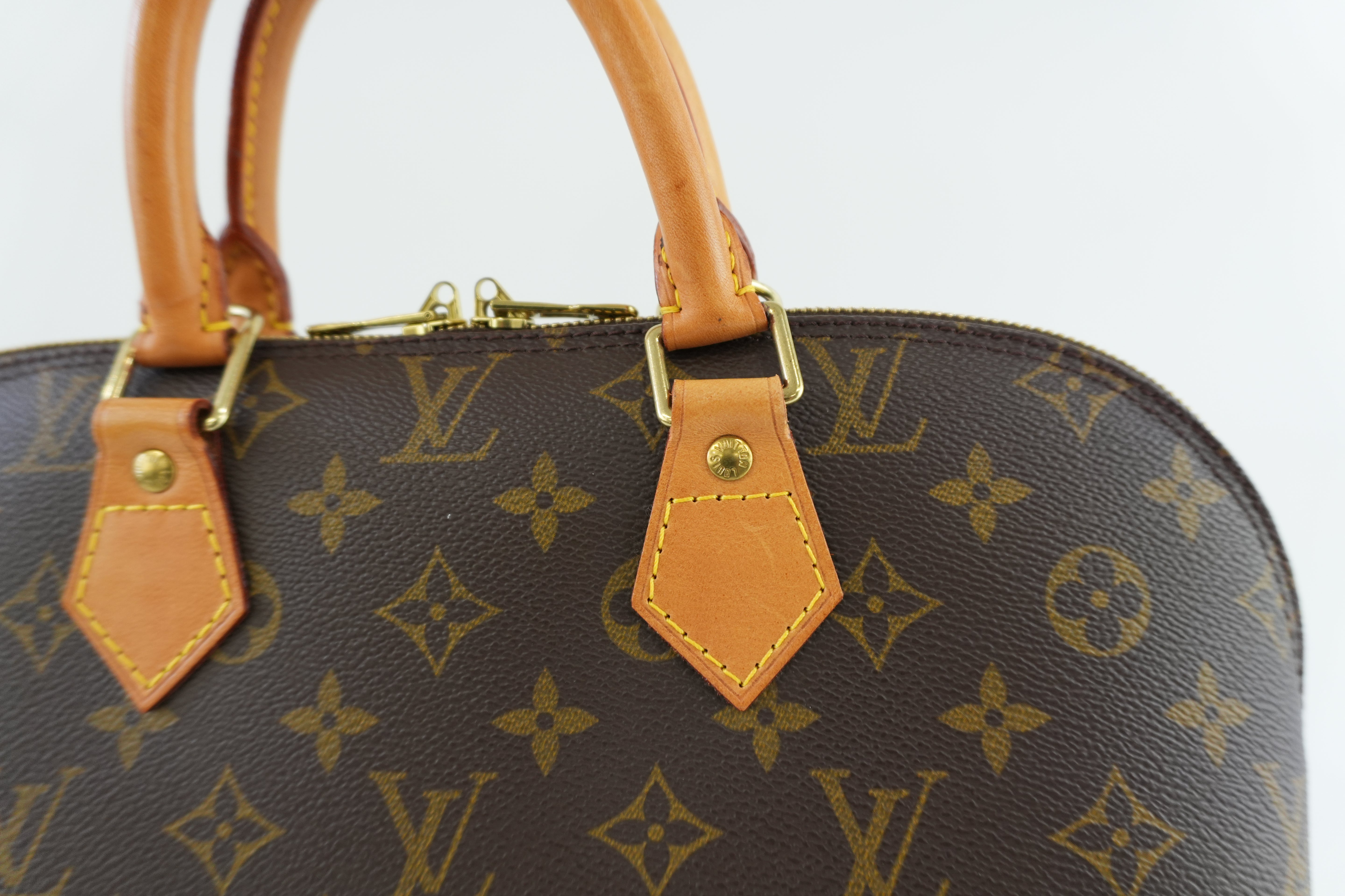 Louis Vuitton Monogram Alma Handbag Used