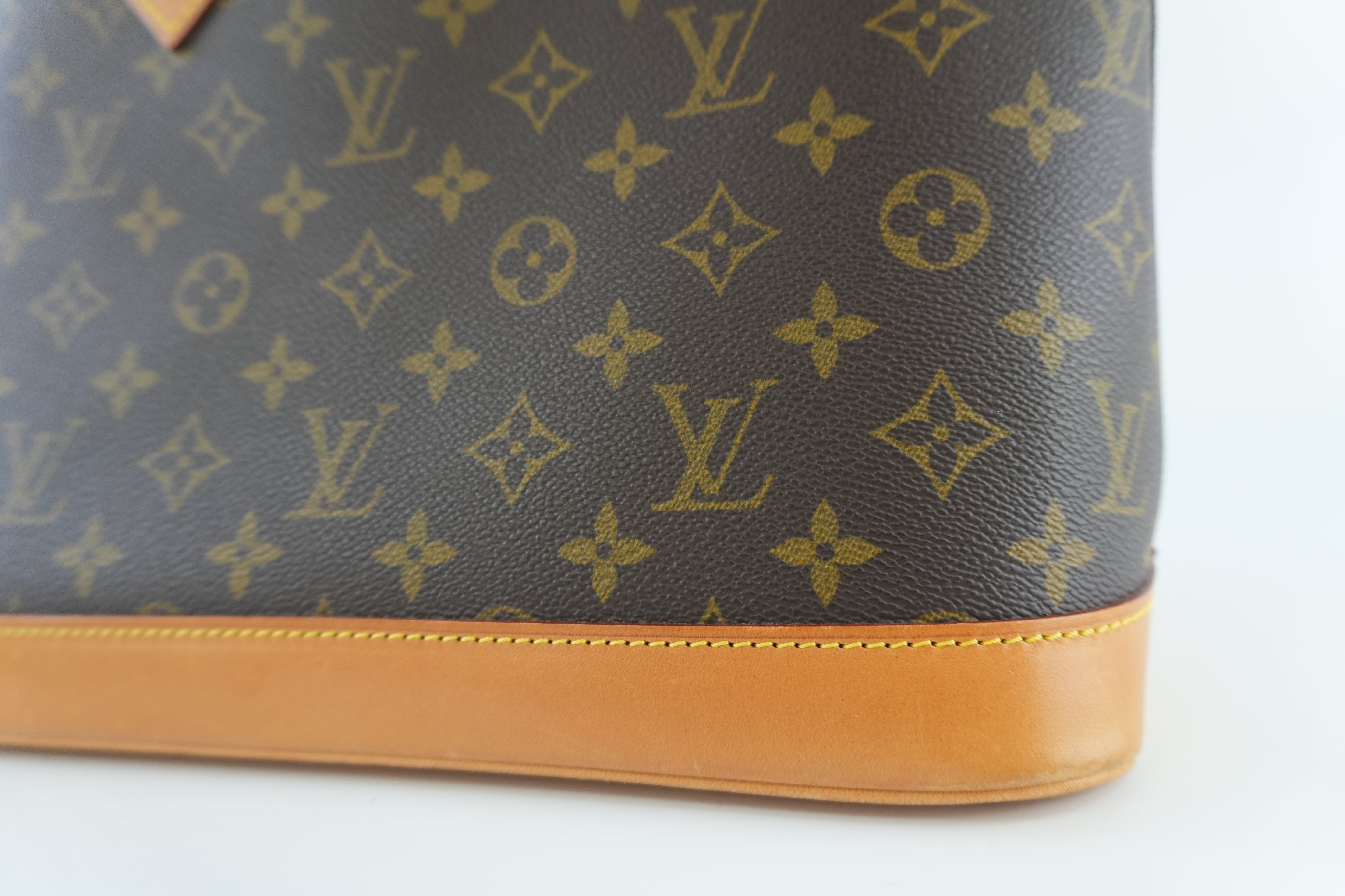 Louis Vuitton Monogram Alma Handbag Used