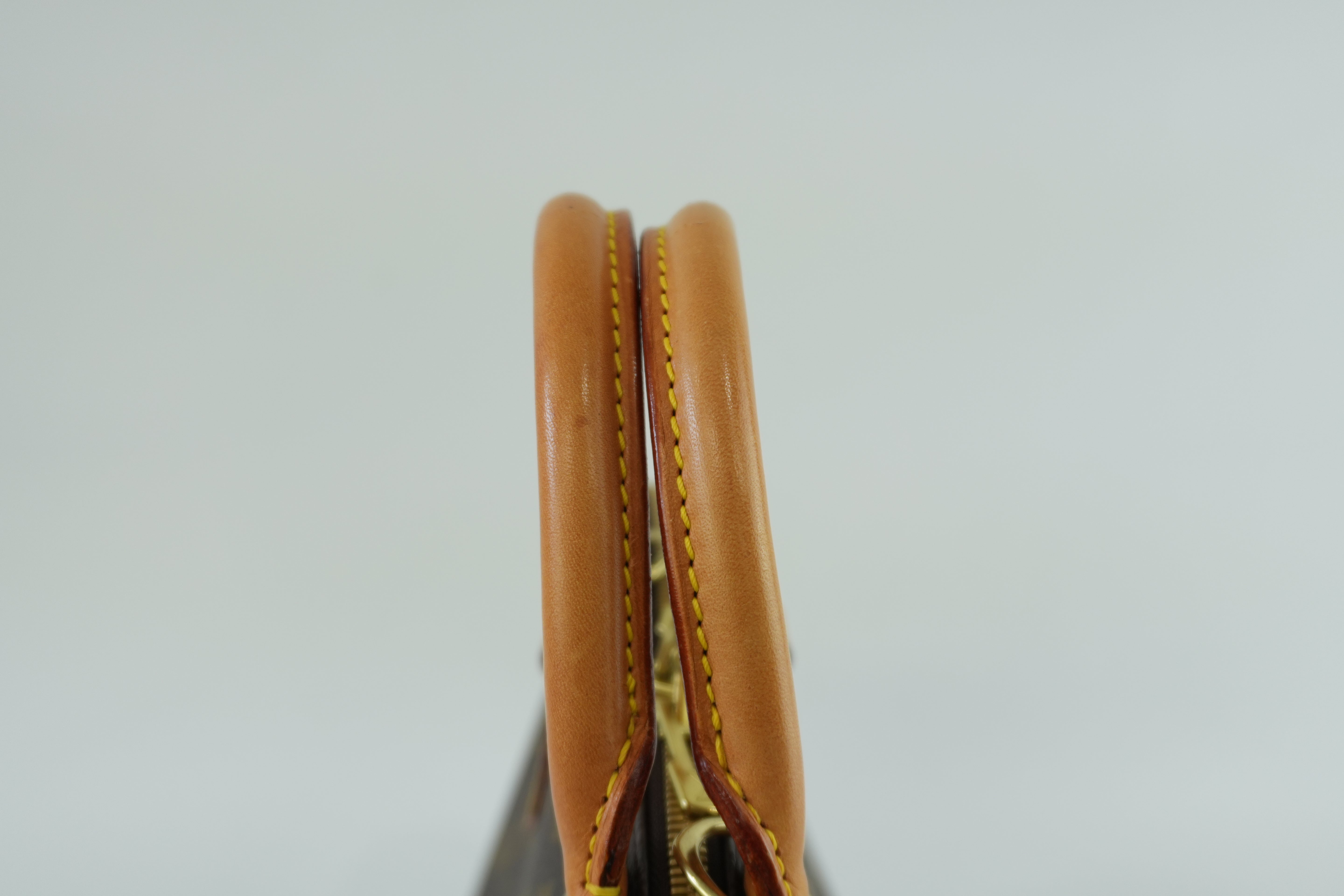 Louis Vuitton Monogram Alma Handbag Used