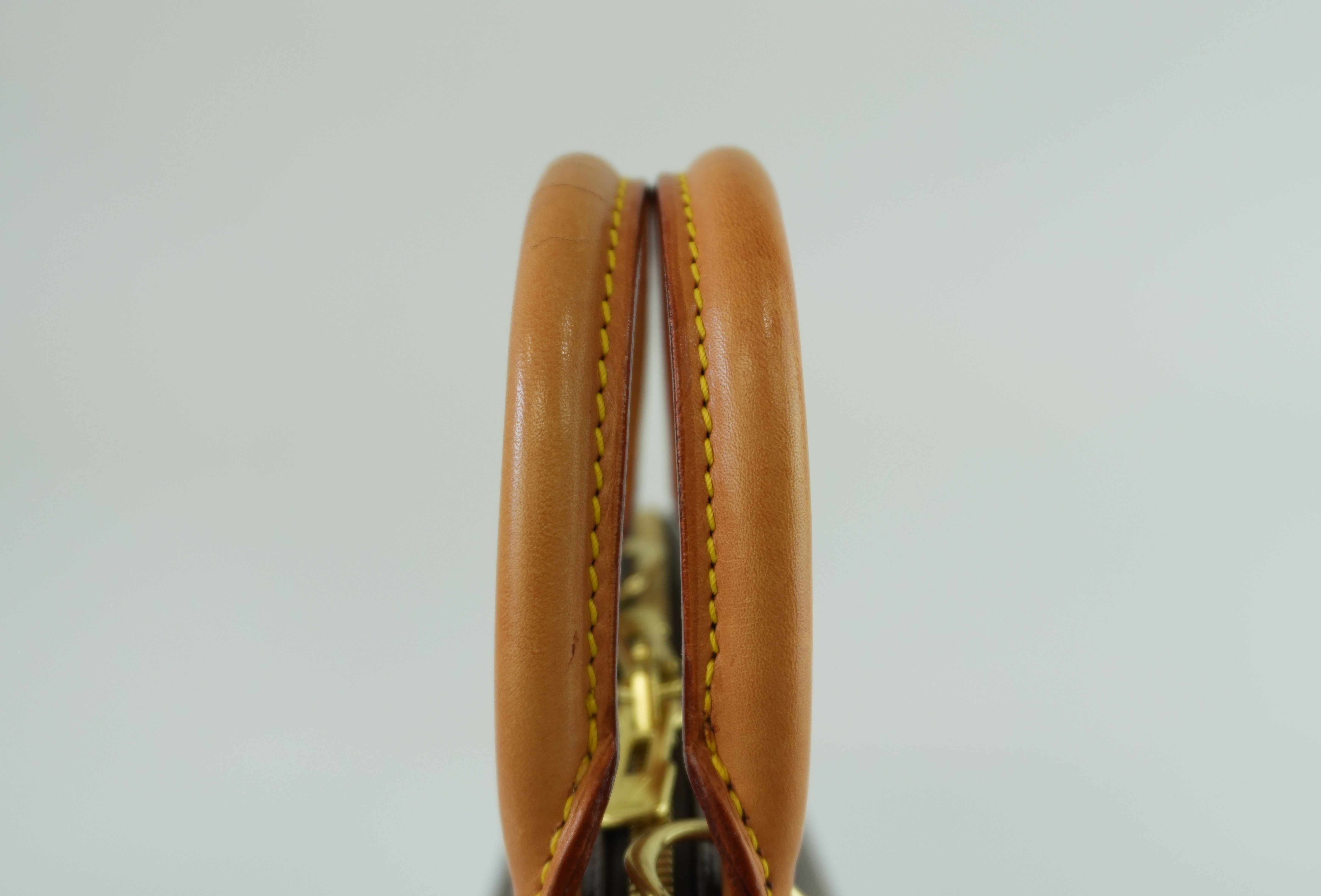 Louis Vuitton Monogram Alma Handbag Used