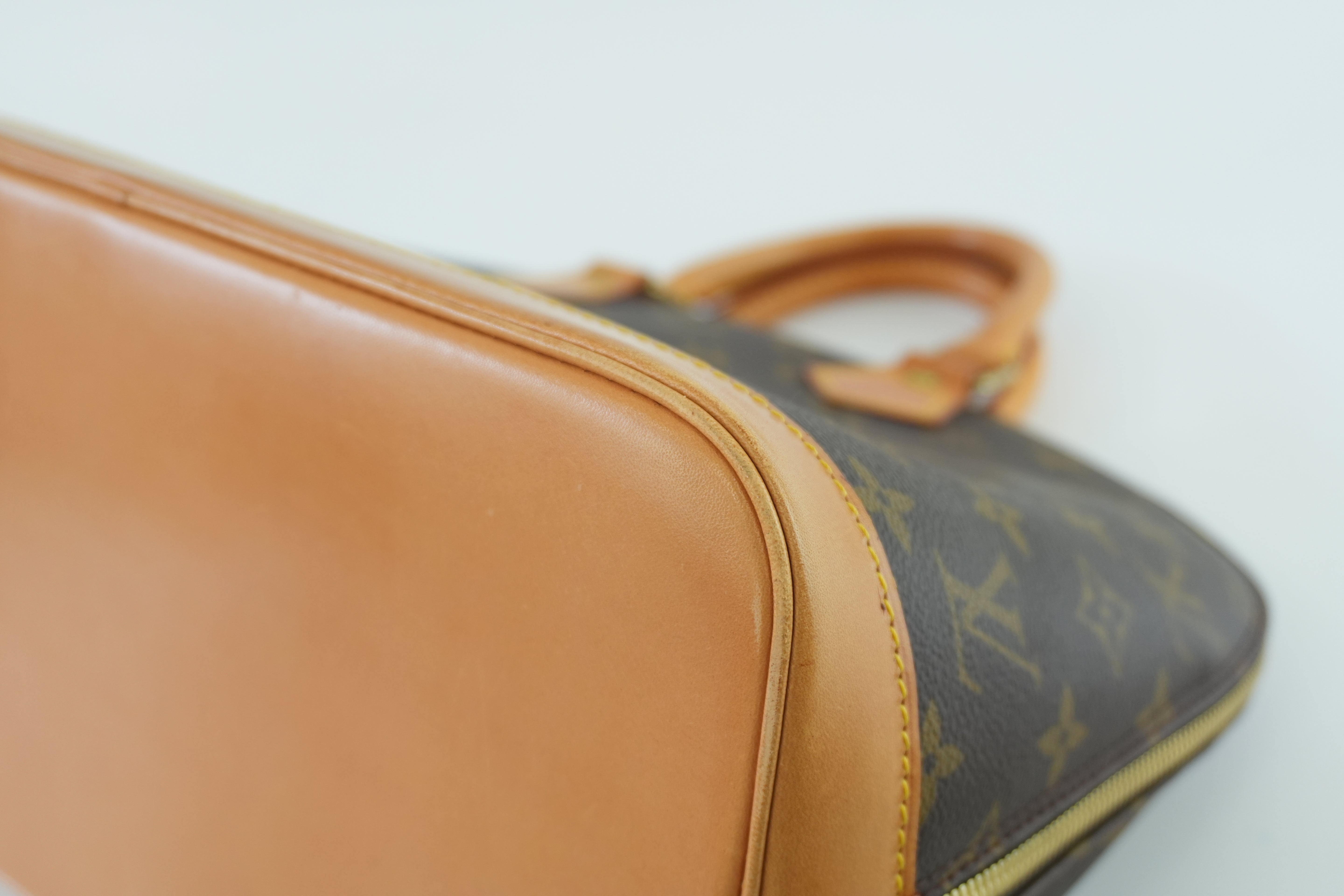 Louis Vuitton Monogram Alma Handbag Used