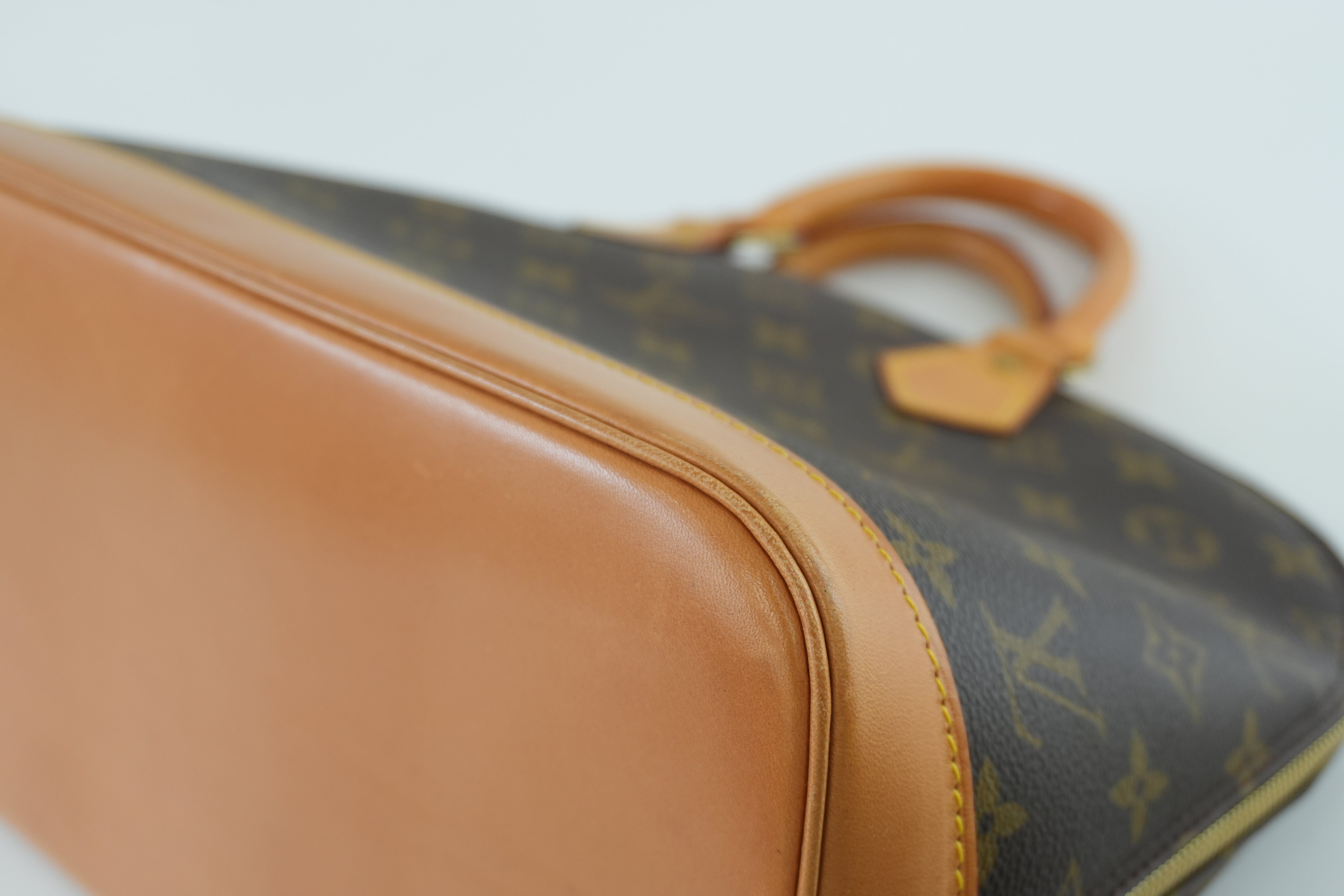 Louis Vuitton Monogram Alma Handbag Used