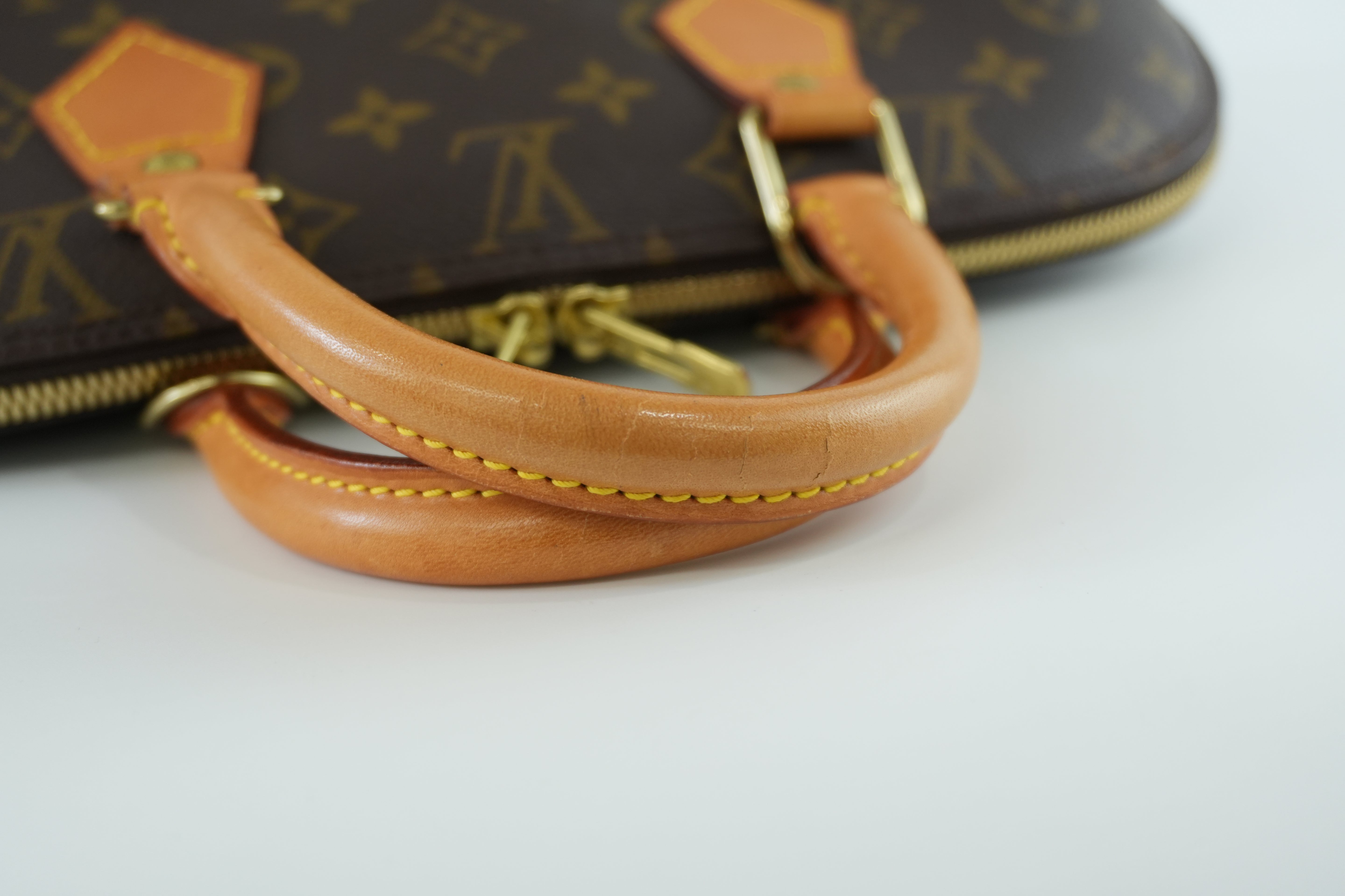 Louis Vuitton Monogram Alma Handbag Used