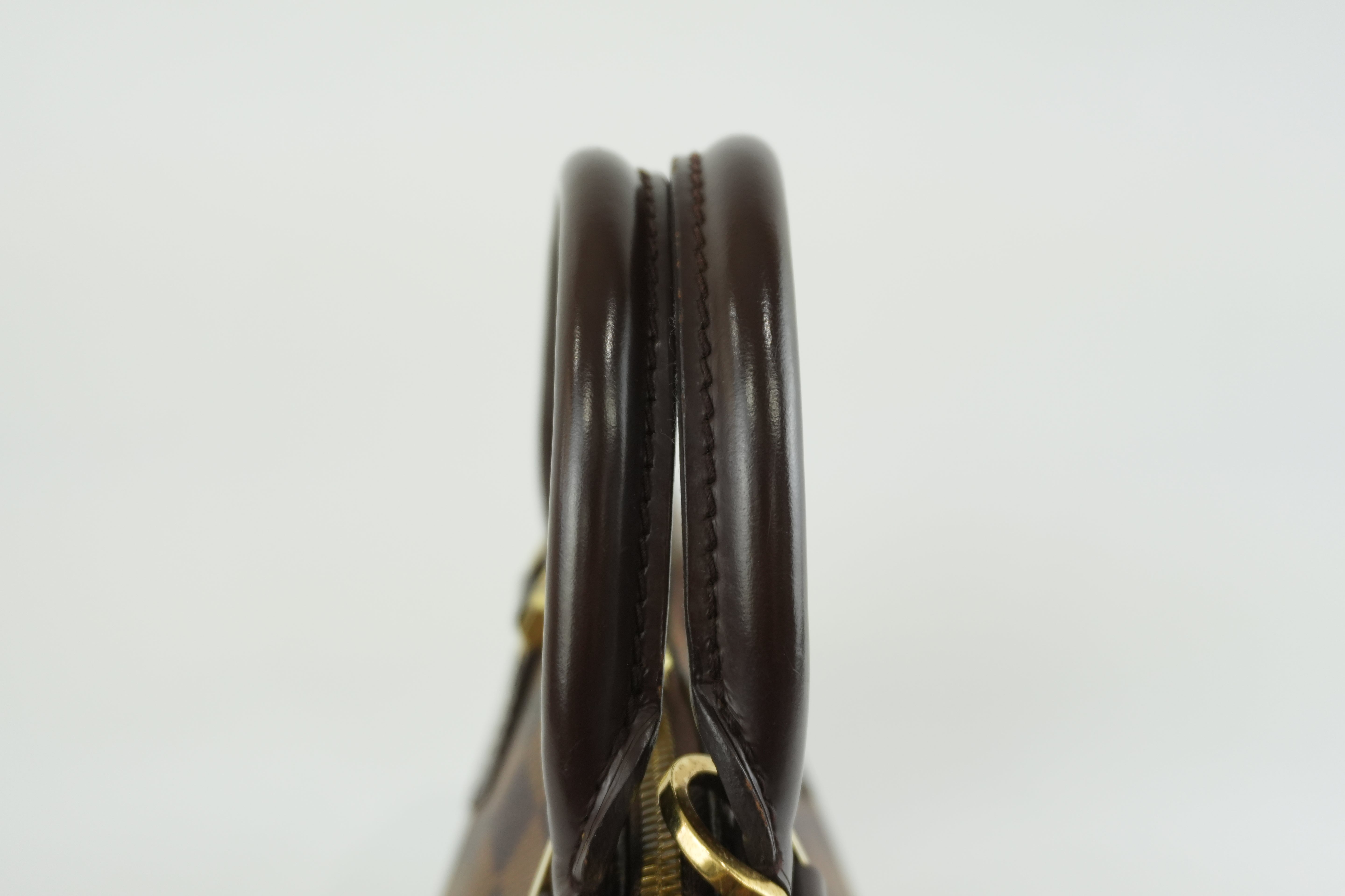 Louis Vuitton Damier Ebene Alma PM Handbag Used