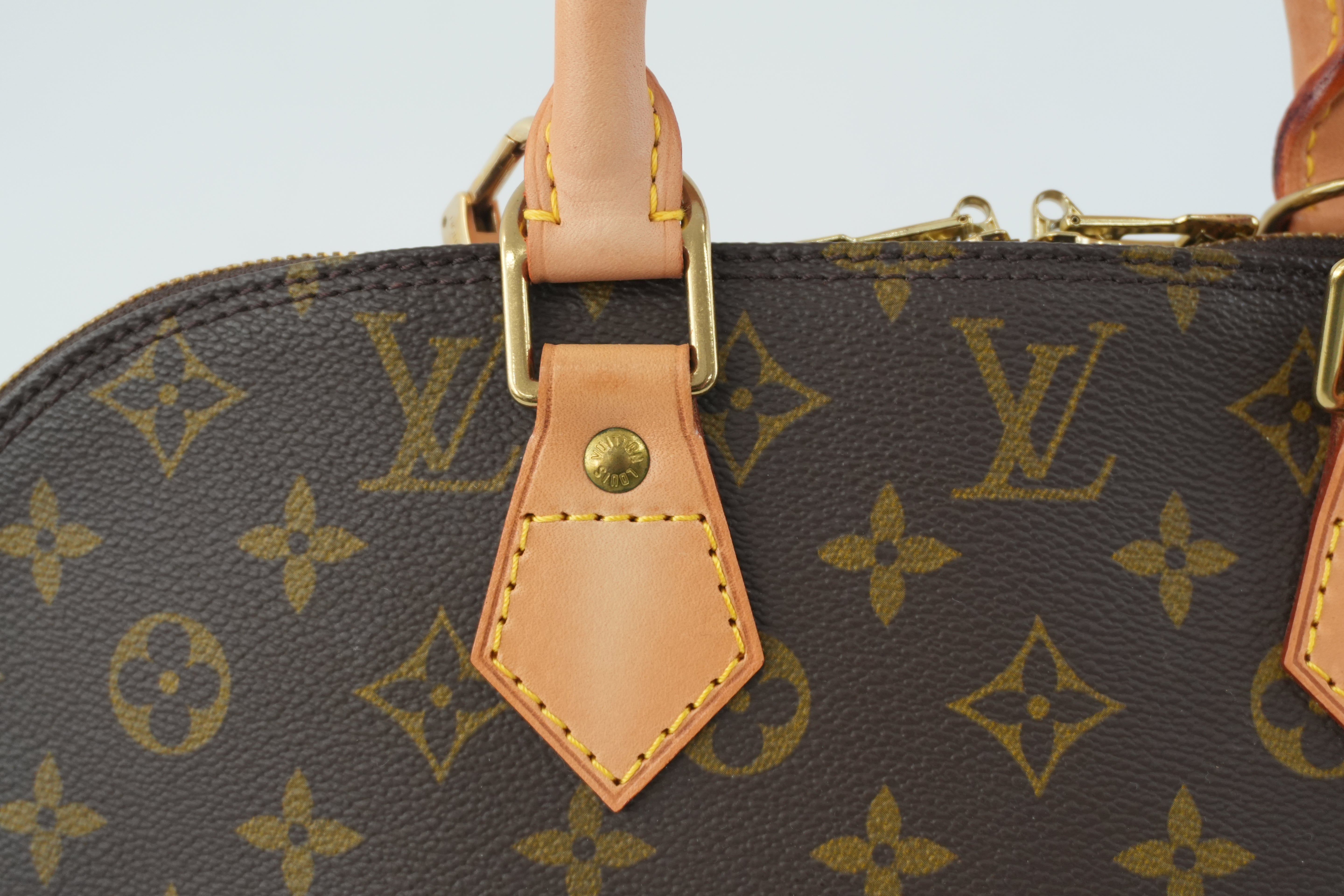 Louis Vuitton Monogram Alma Handbag Used
