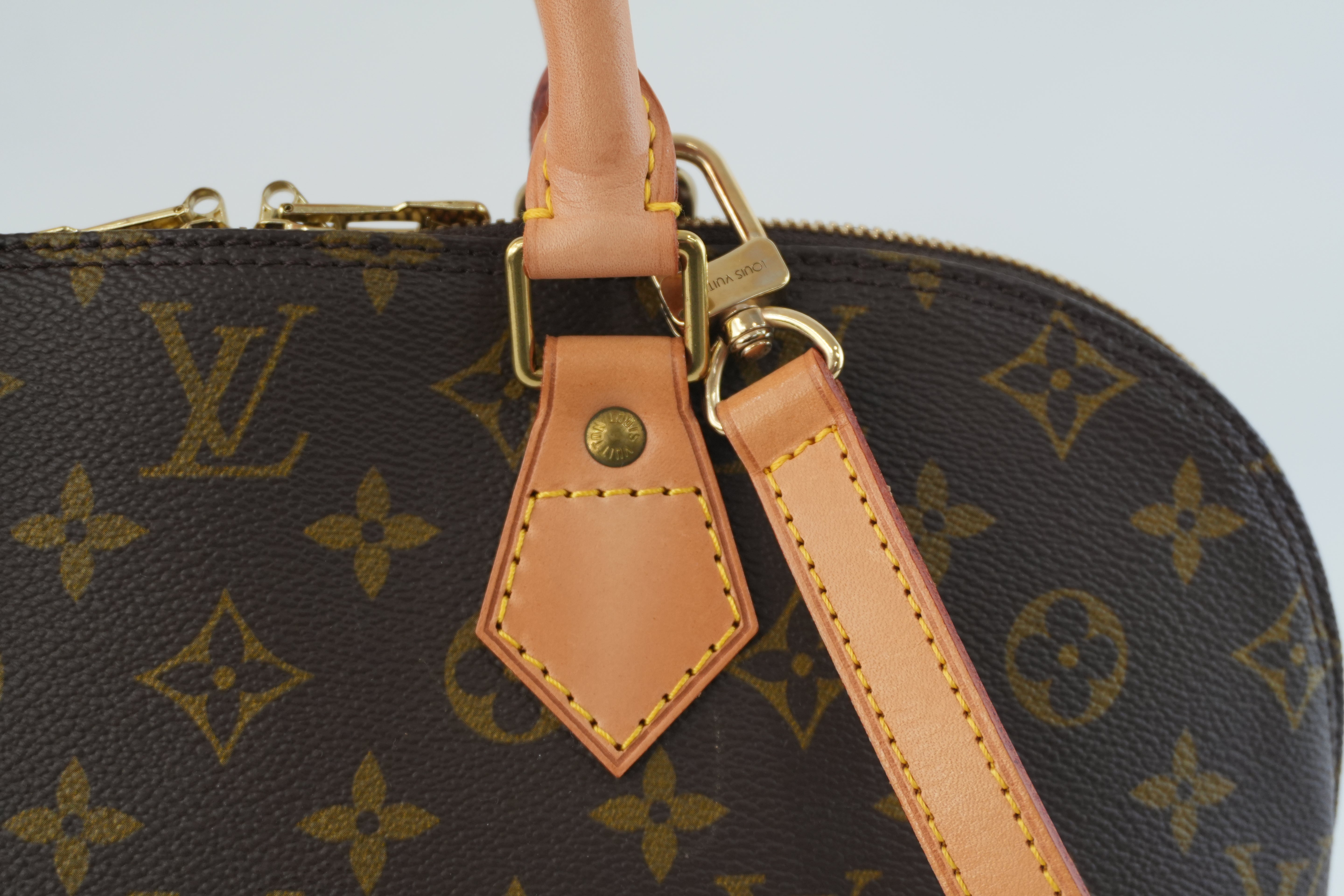 Louis Vuitton Monogram Alma Handbag Used