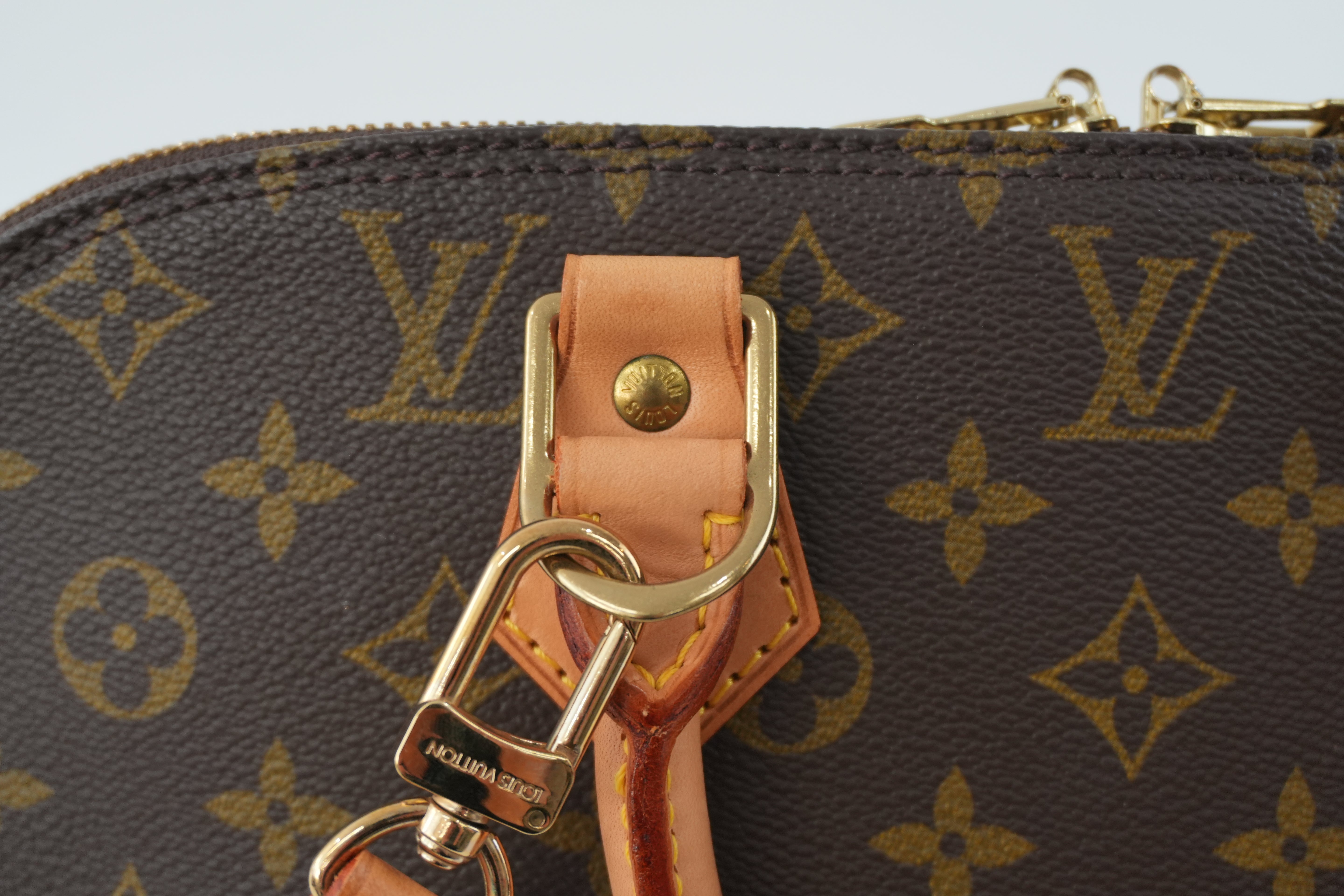 Louis Vuitton Monogram Alma Handbag Used