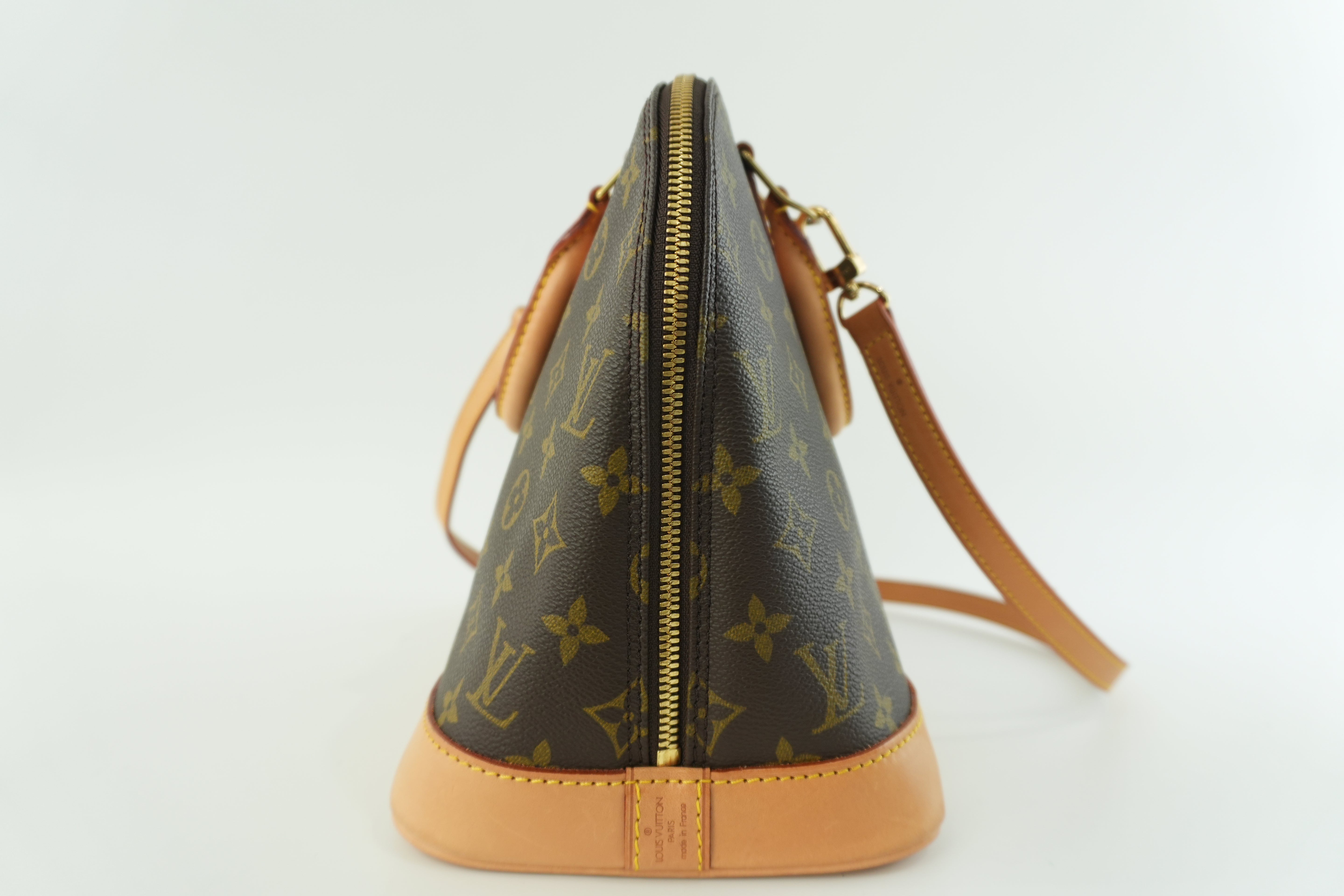 Louis Vuitton Monogram Alma Handbag Used