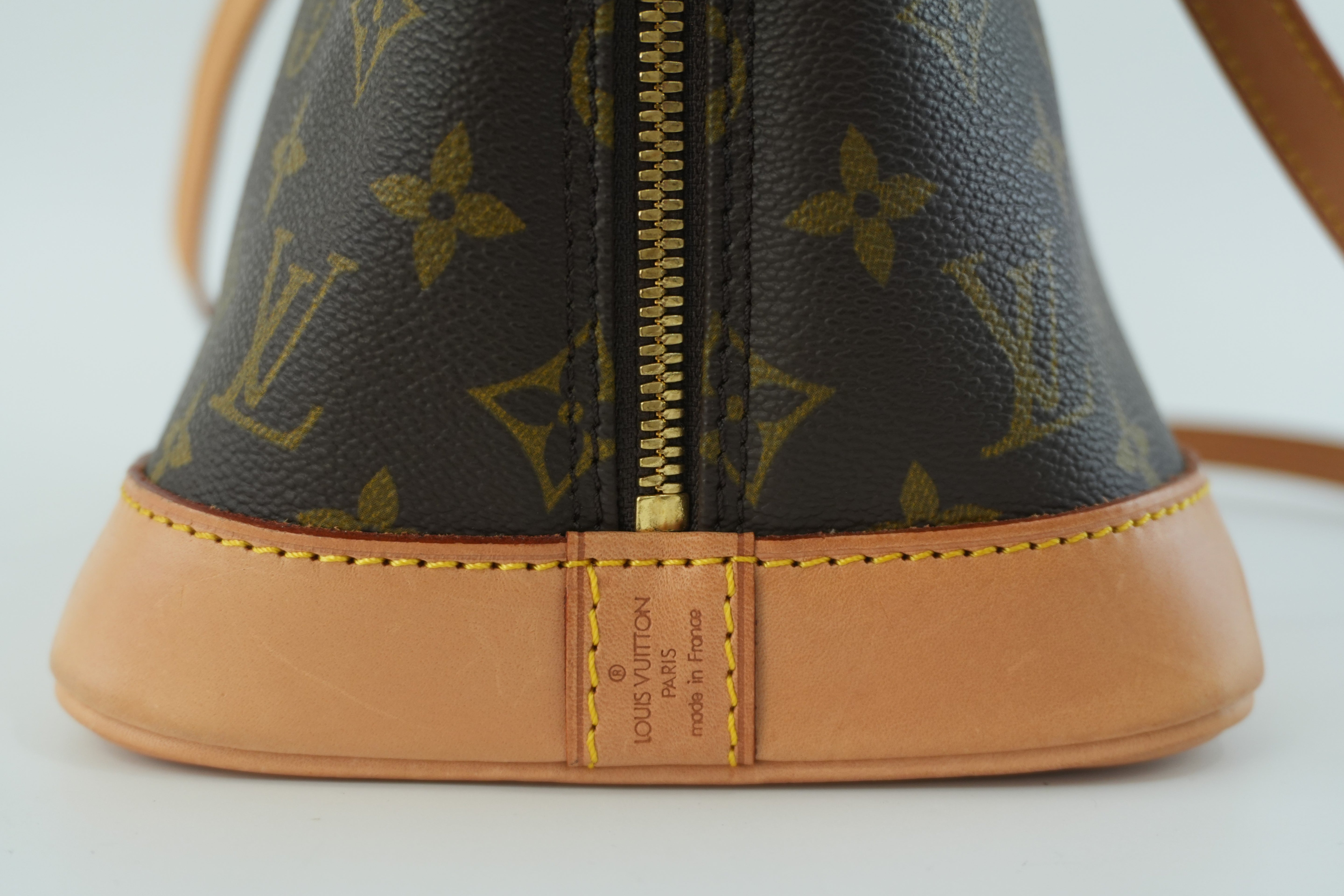 Louis Vuitton Monogram Alma Handbag Used