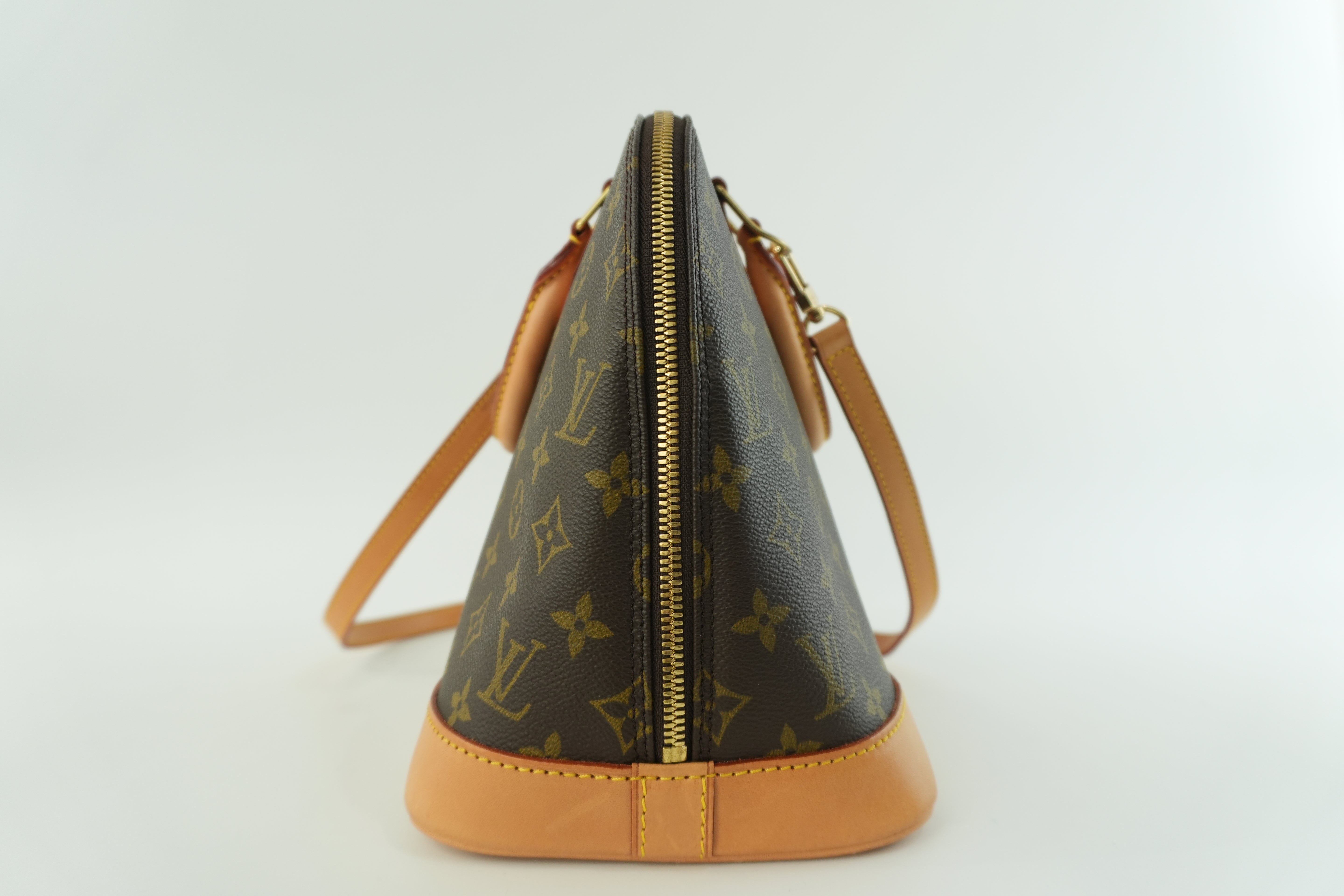 Louis Vuitton Monogram Alma Handbag Used