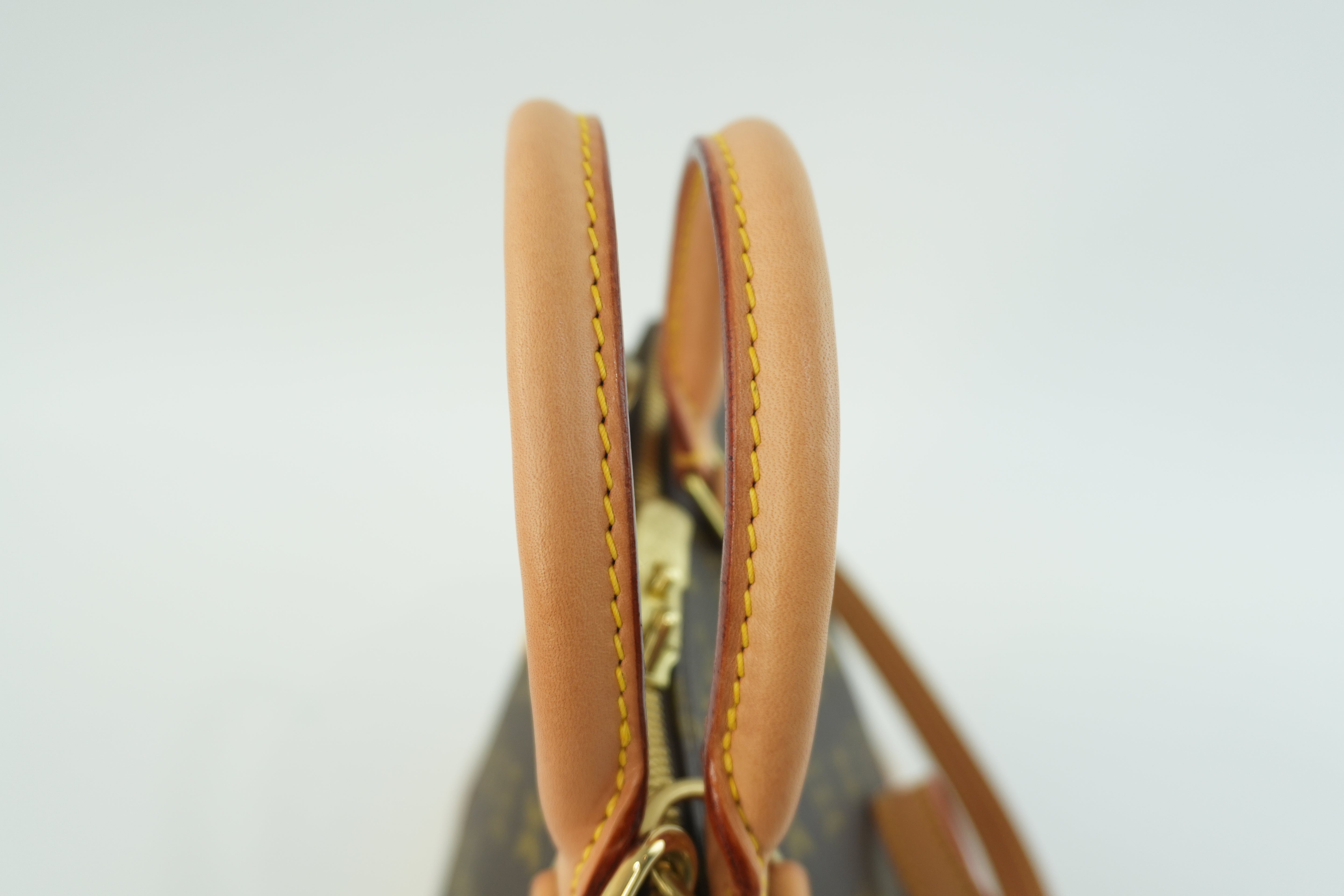 Louis Vuitton Monogram Alma Handbag Used