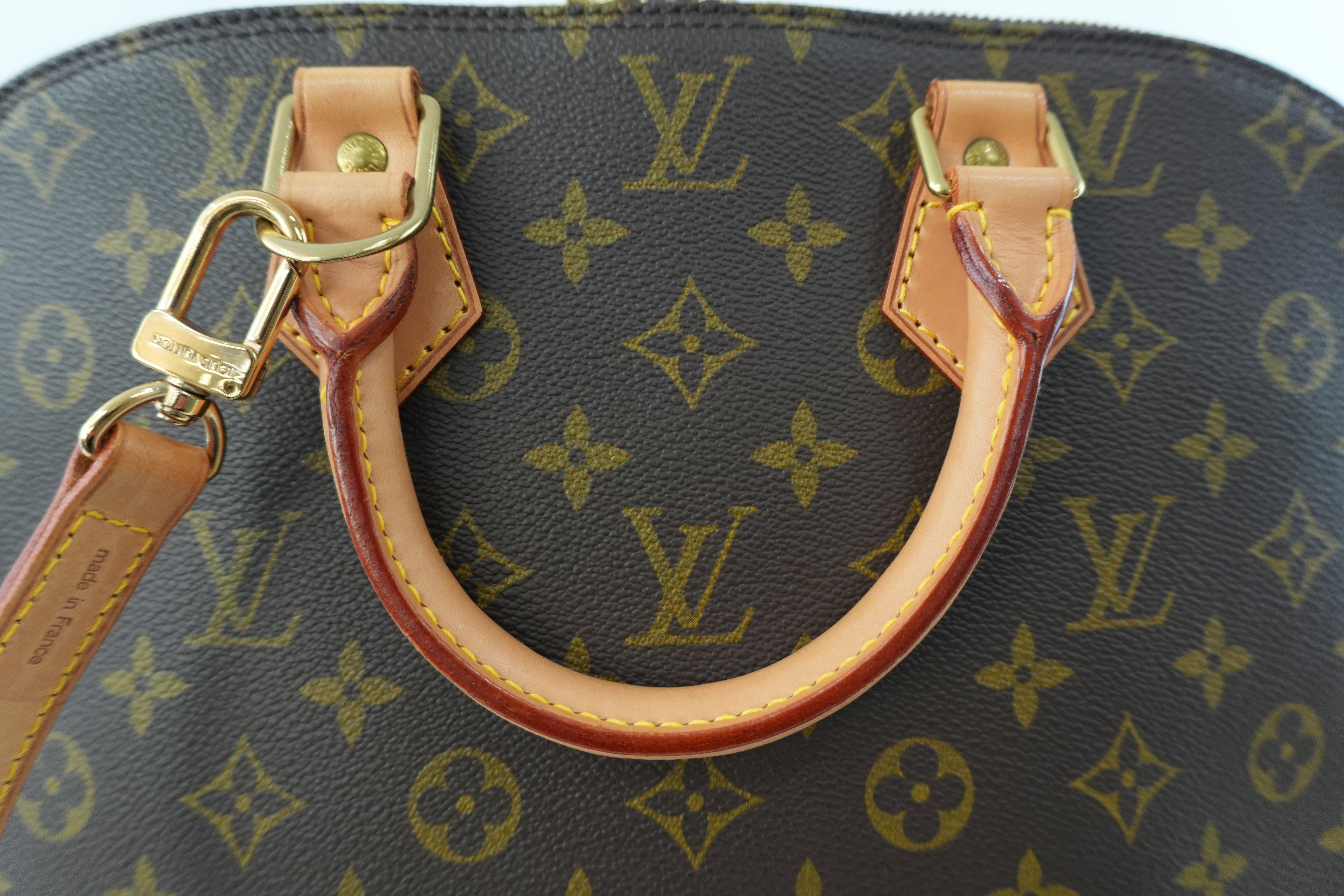 Louis Vuitton Monogram Alma Handbag Used