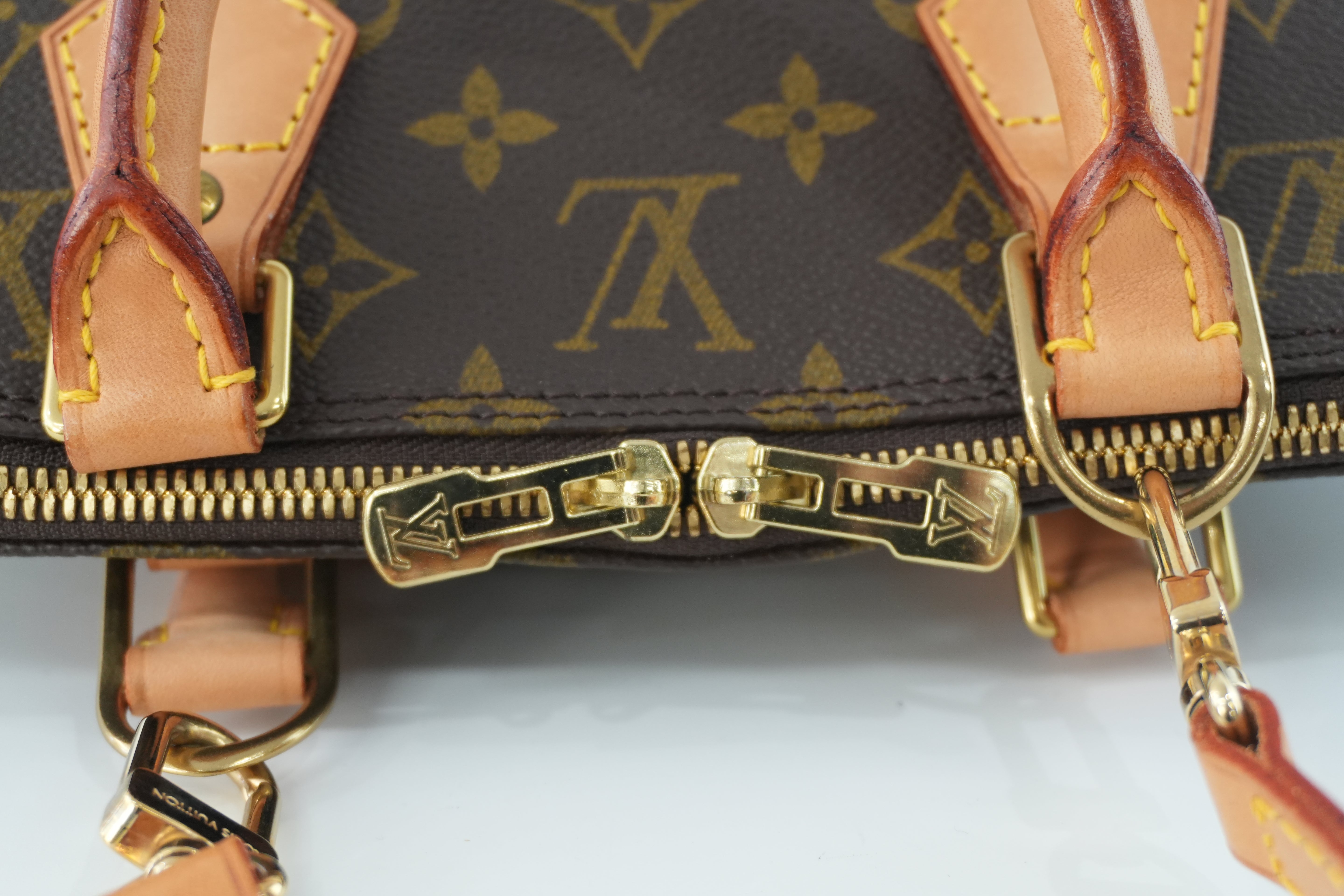 Louis Vuitton Monogram Alma Handbag Used