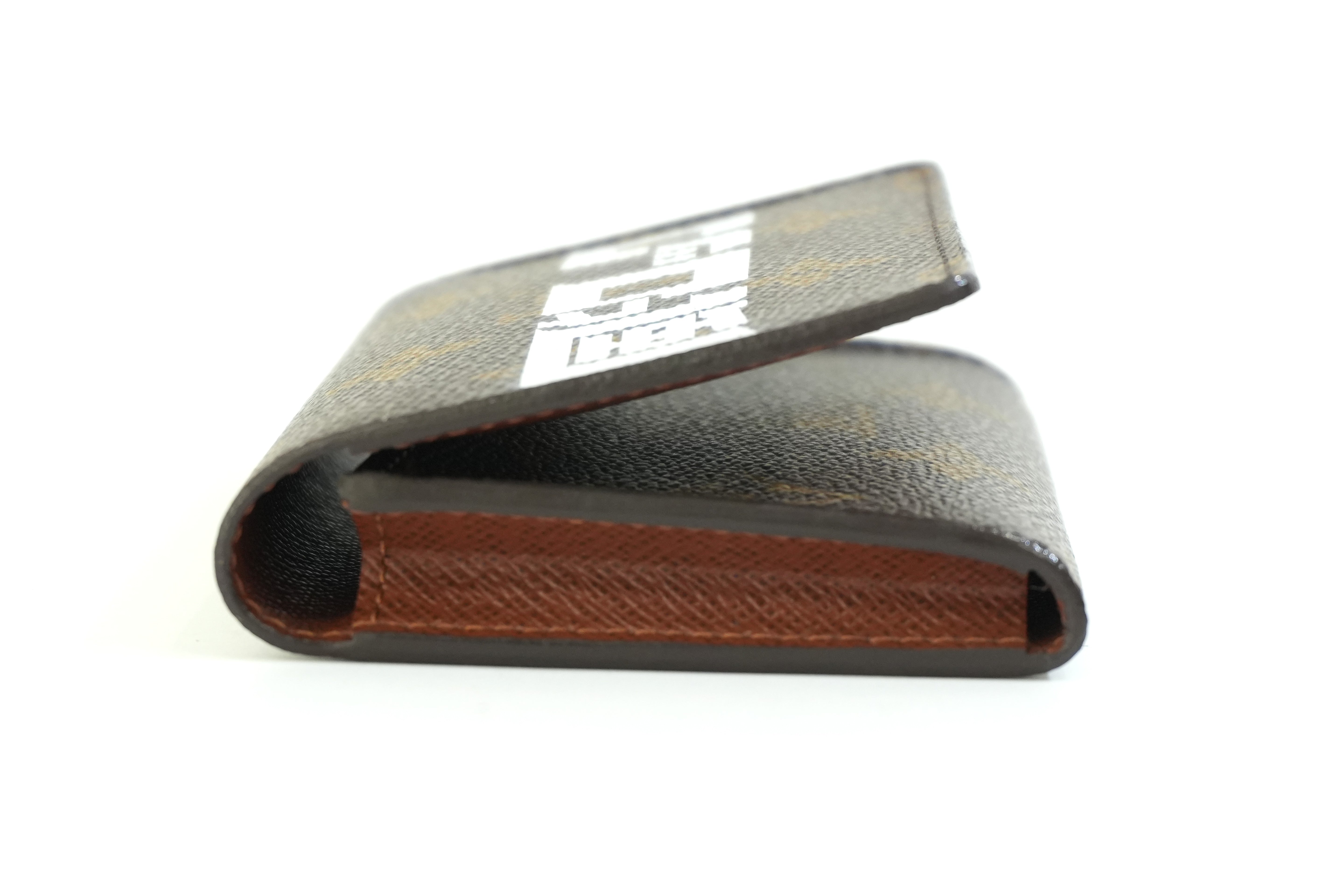 Pre-owned Louis Vuitton Monogram Wild Rock Card Case
