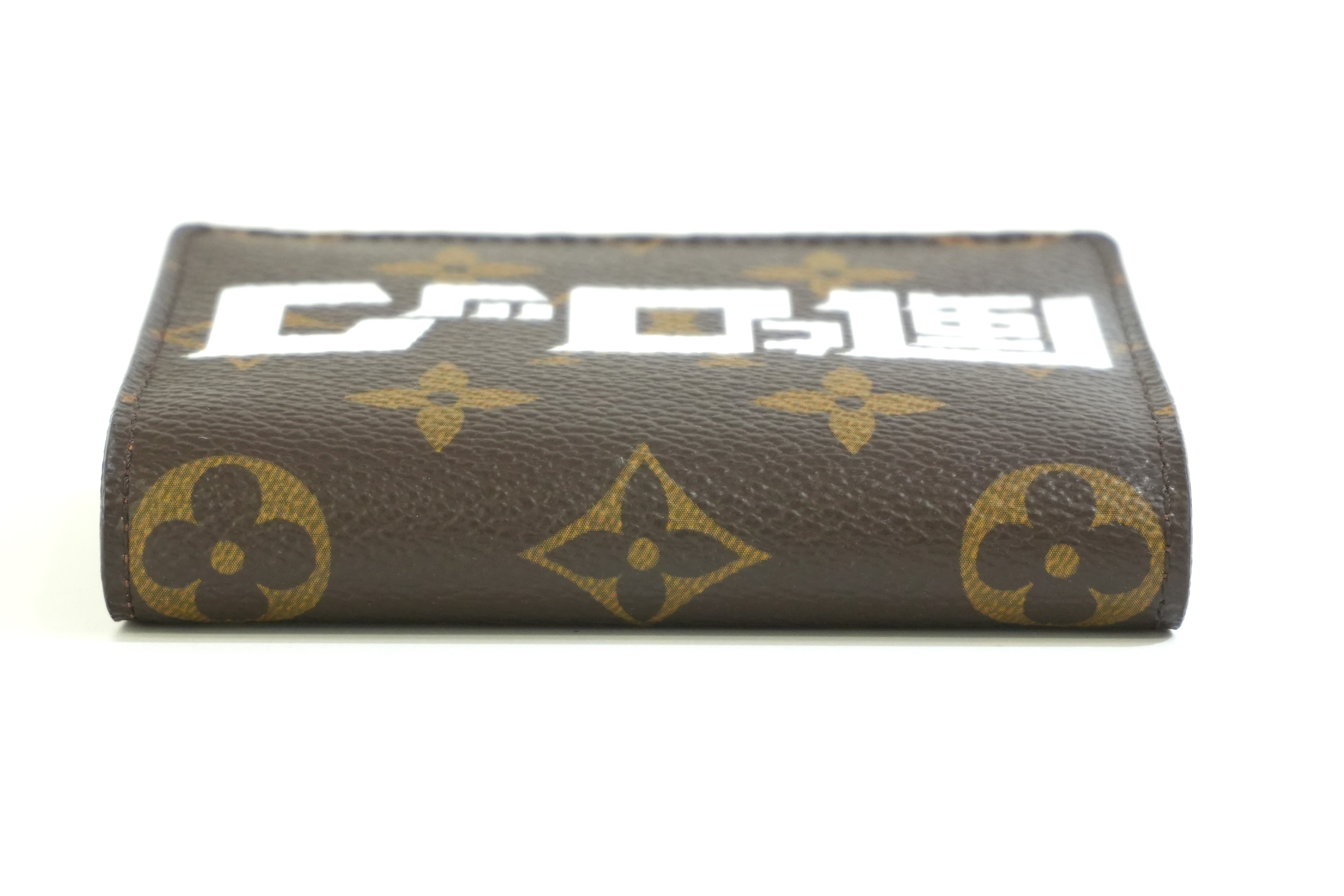 Pre-owned Louis Vuitton Monogram Wild Rock Card Case