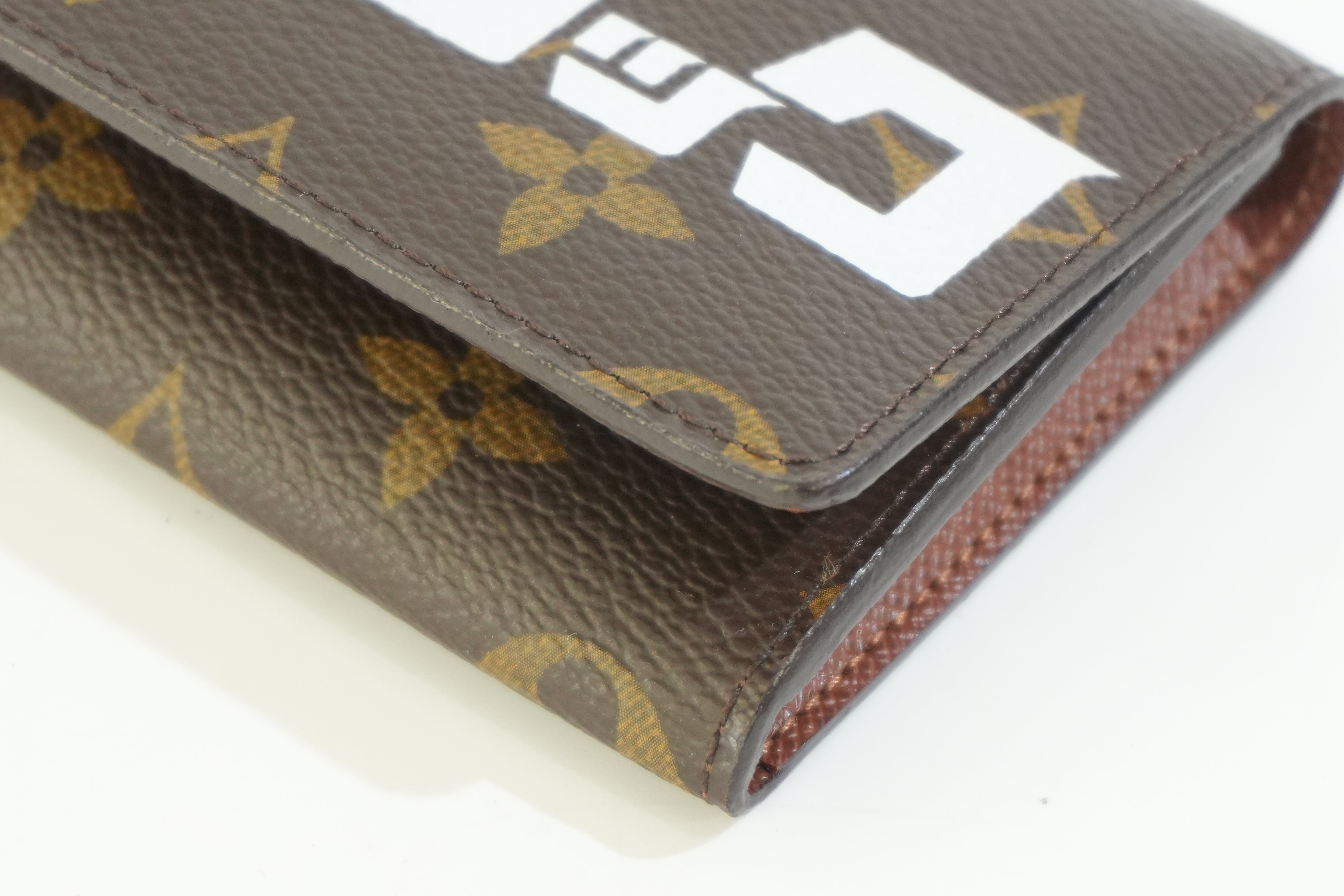 Pre-owned Louis Vuitton Monogram Wild Rock Card Case
