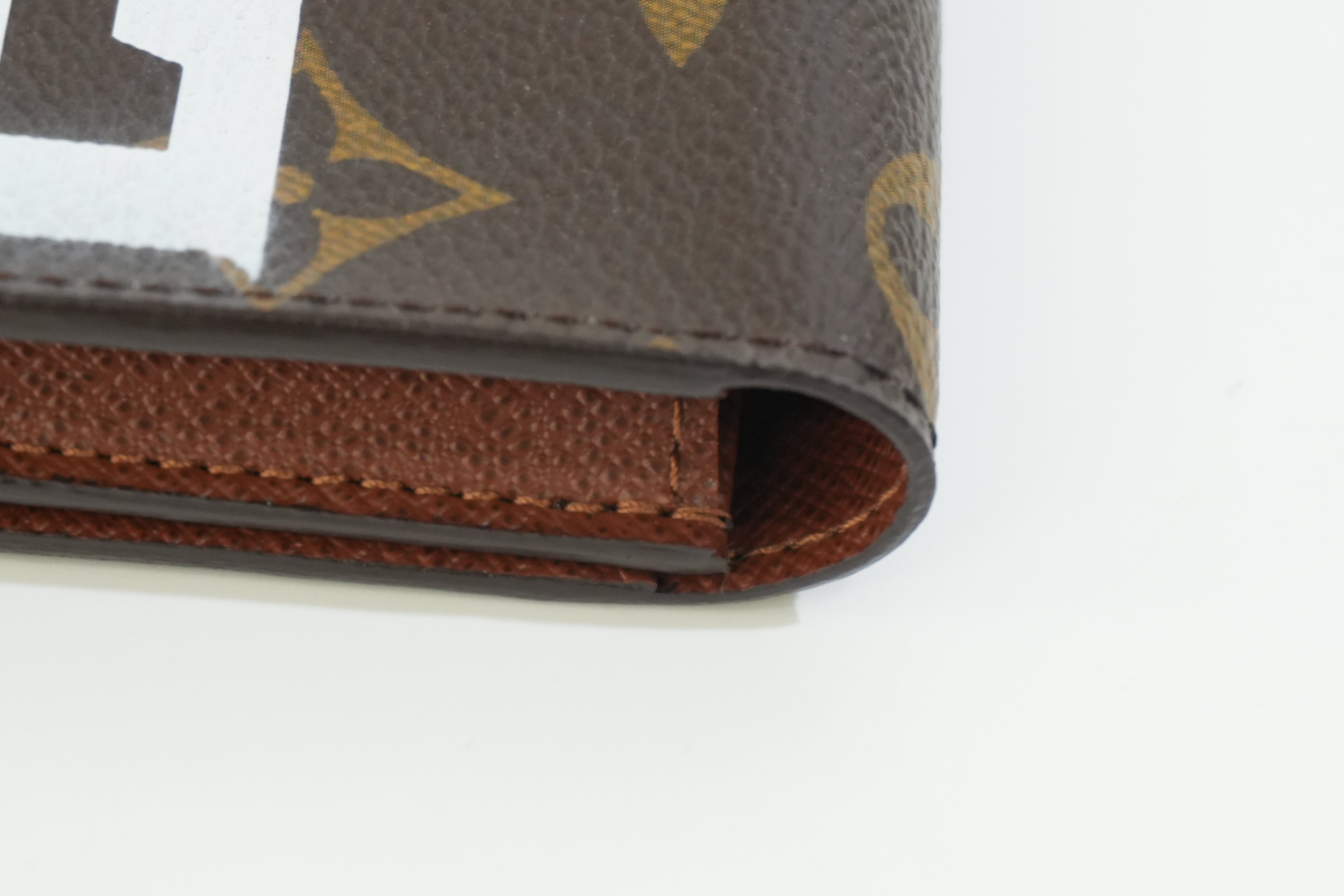 Pre-owned Louis Vuitton Monogram Wild Rock Card Case