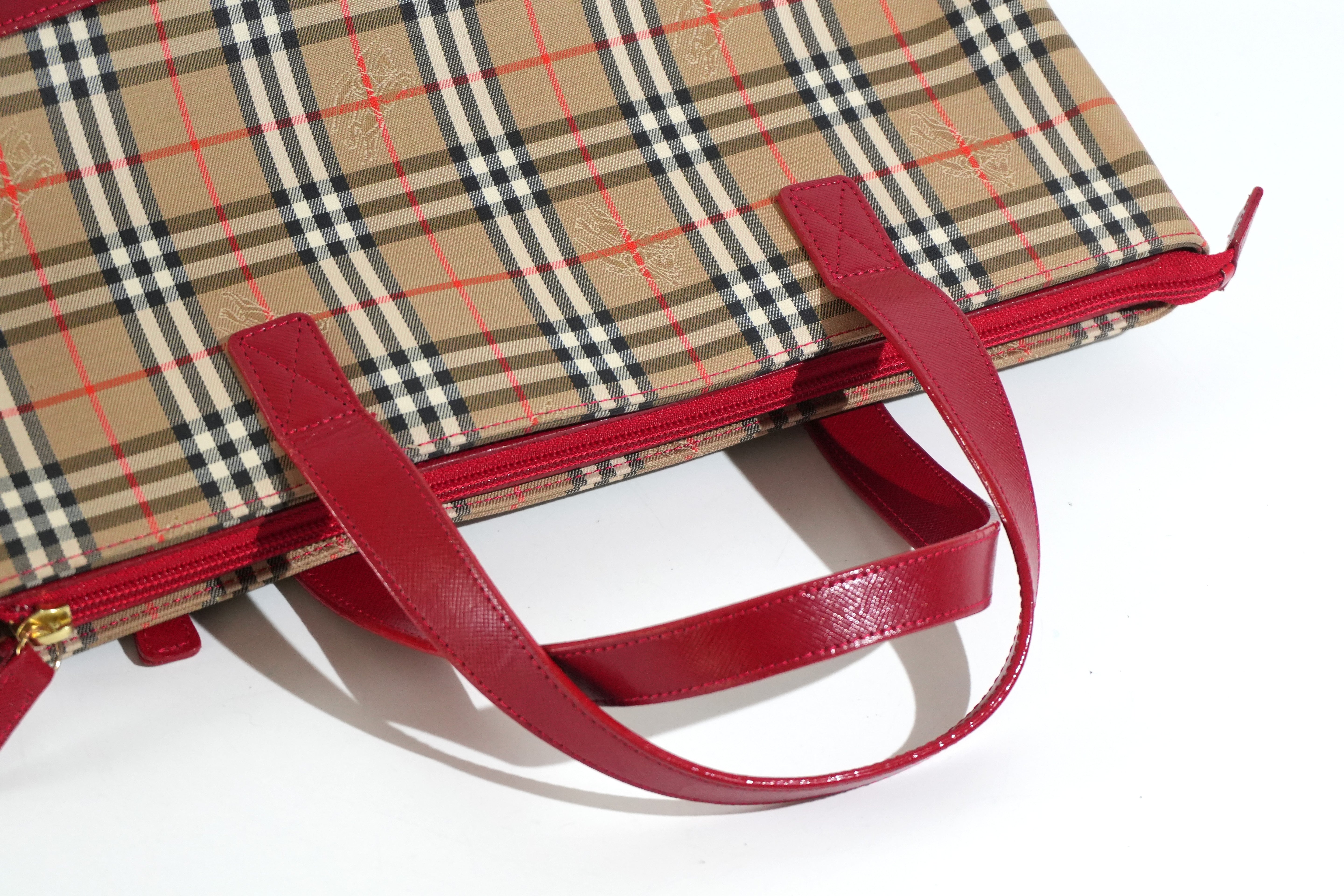 Pre-owned Burberry Haymarket Handbag Red and Brown