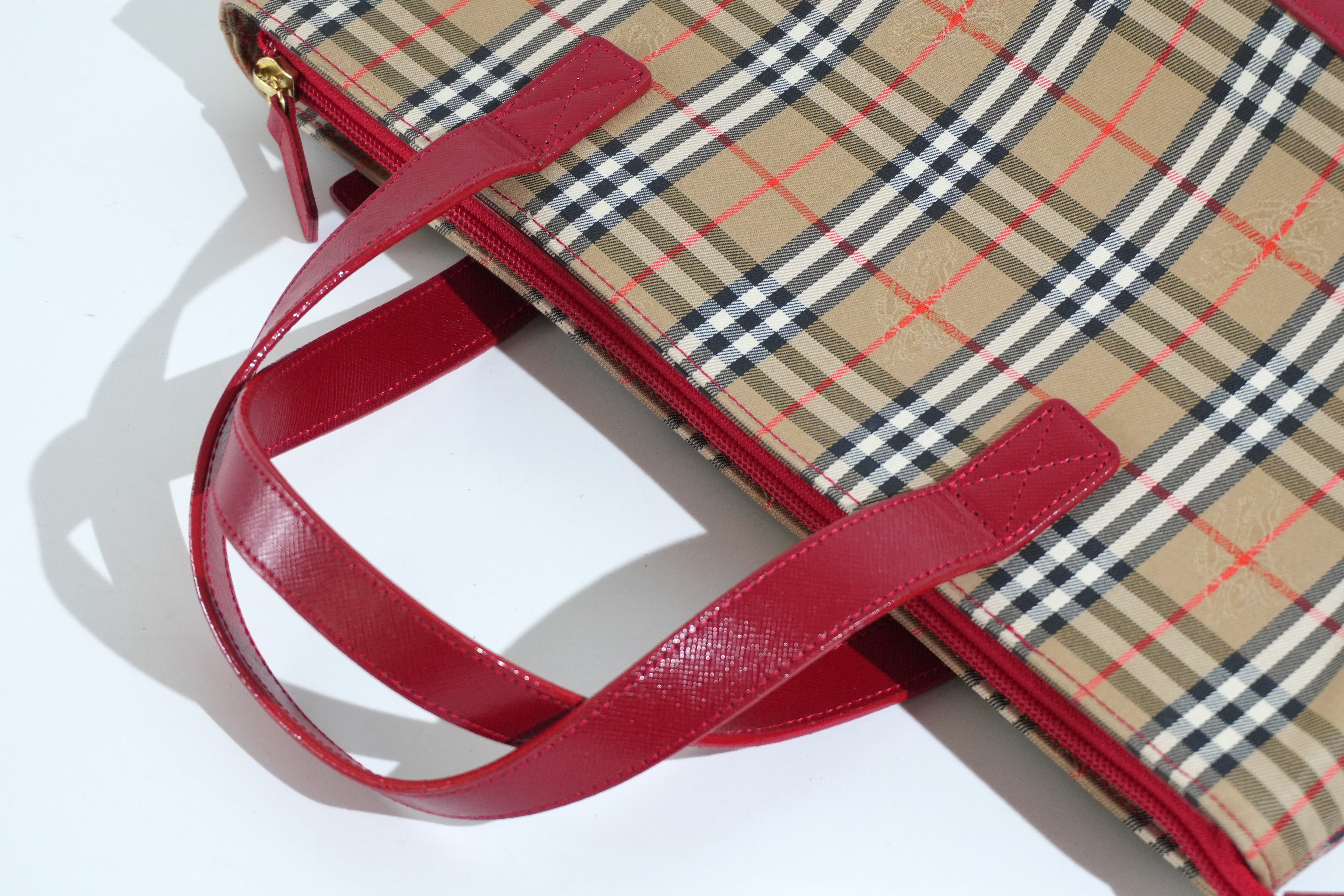 Pre-owned Burberry Haymarket Handbag Red and Brown