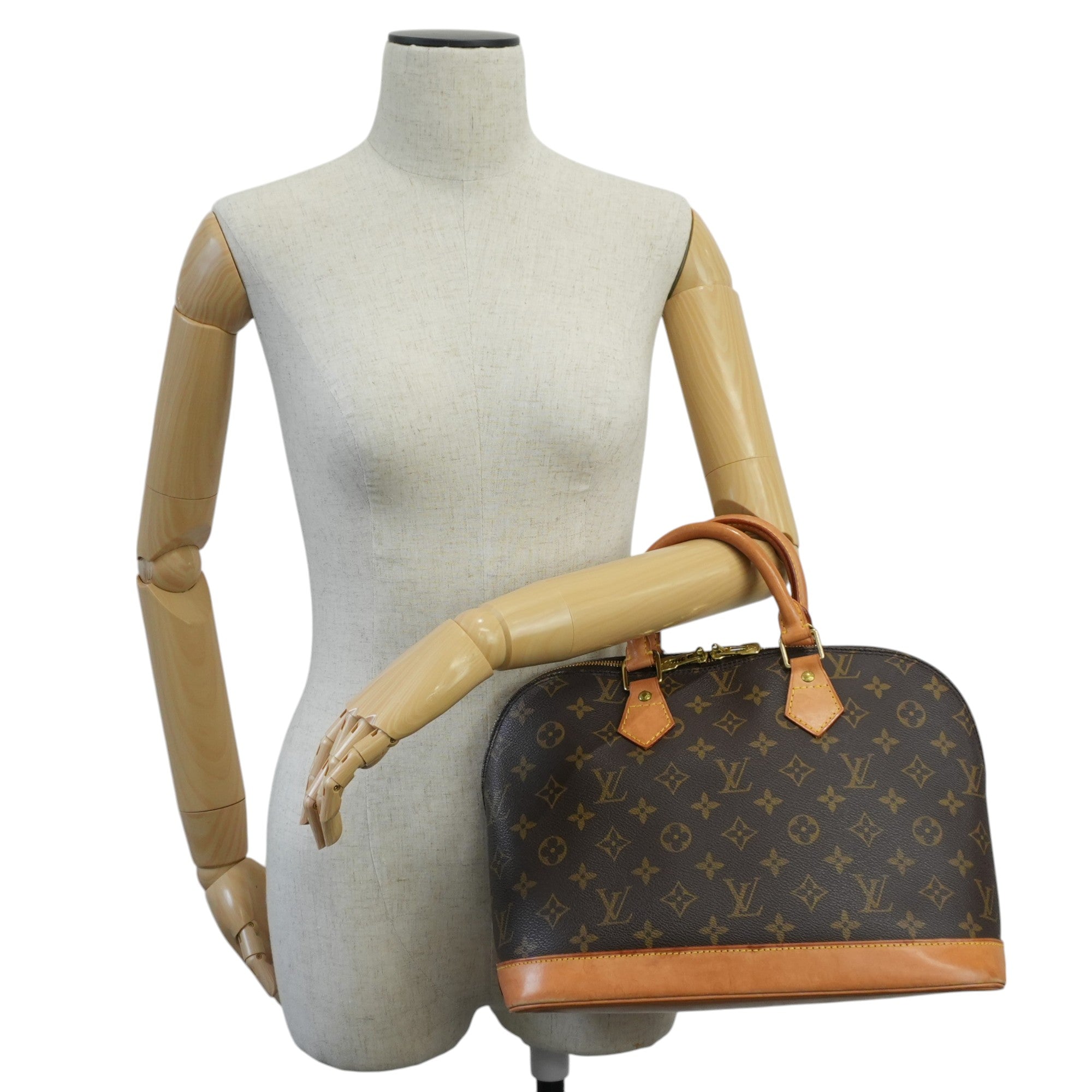 Louis Vuitton Monogram Alma PM Handbag Used
