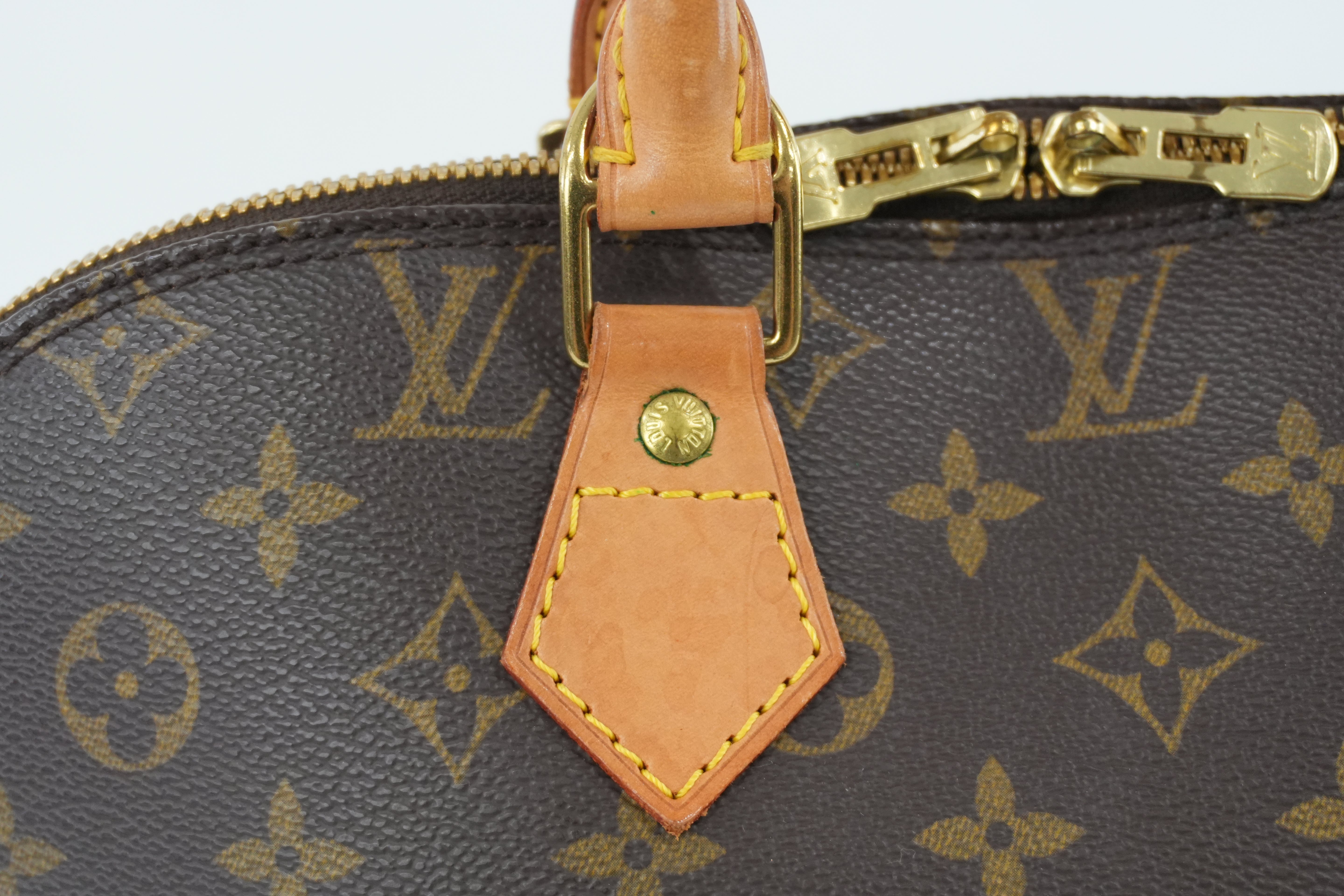 Louis Vuitton Monogram Alma PM Handbag Used