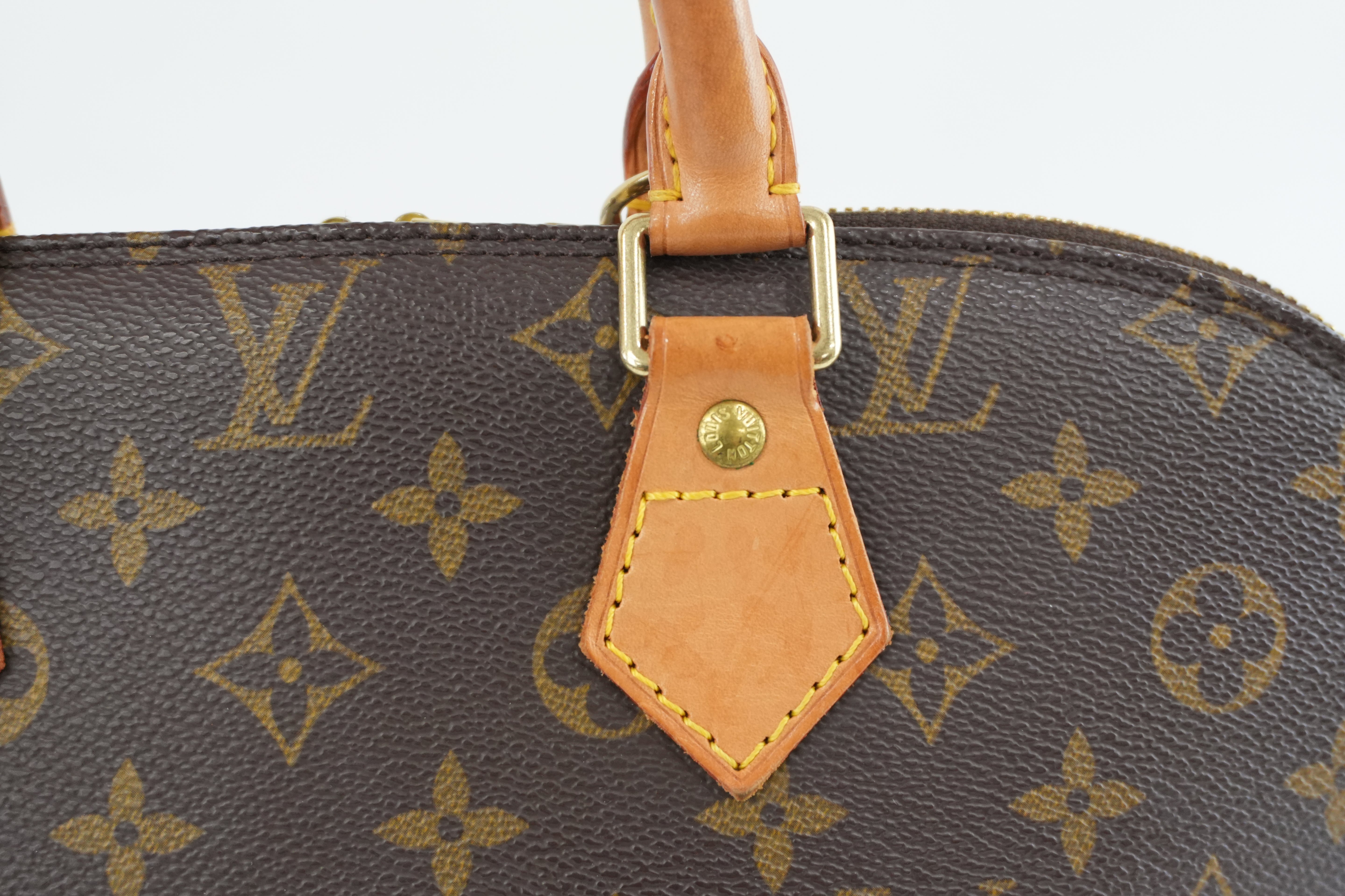 Louis Vuitton Monogram Alma PM Handbag Used